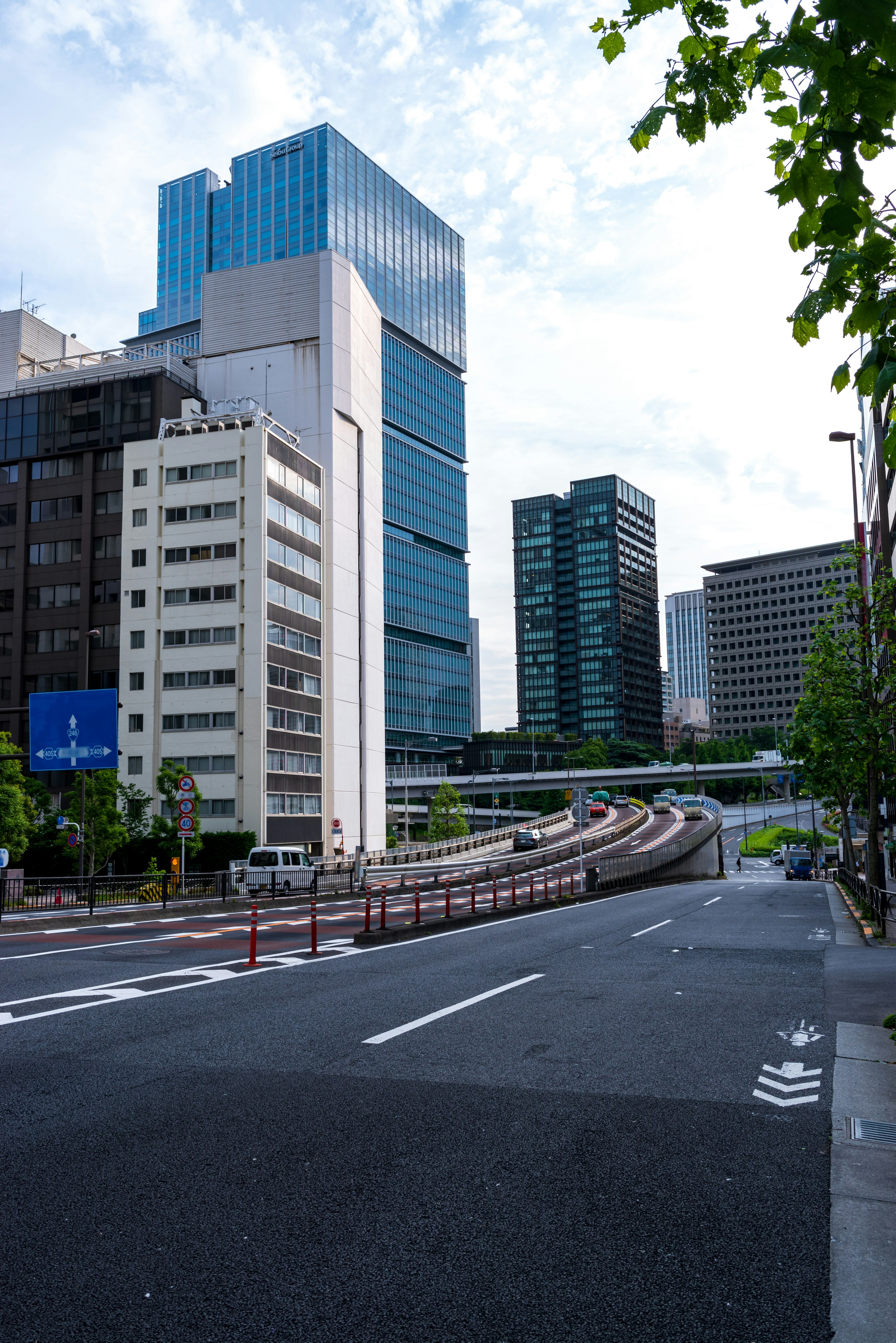 Urban landscape with modern buildings and a winding road