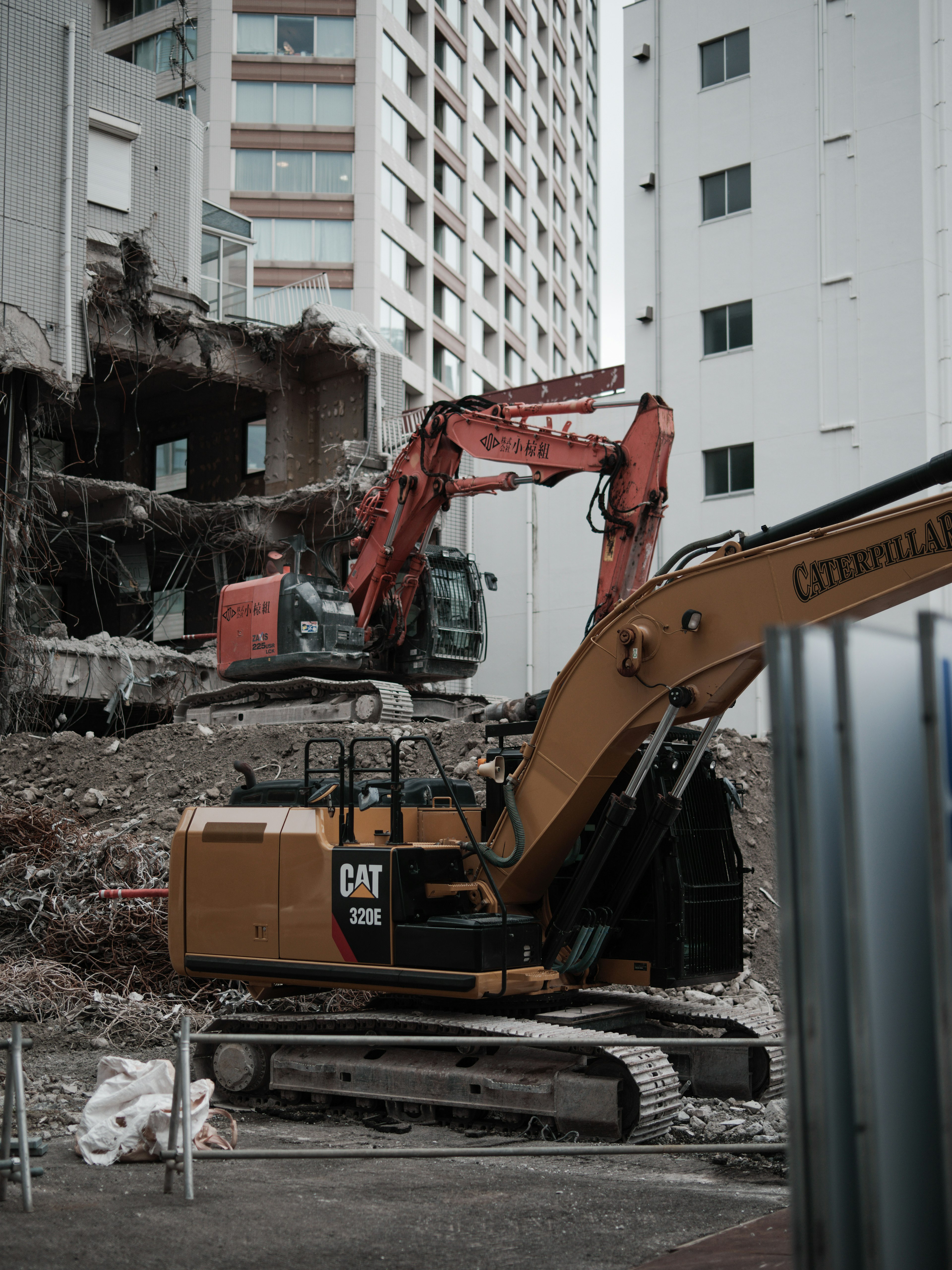 Construction site with heavy machinery and cranes