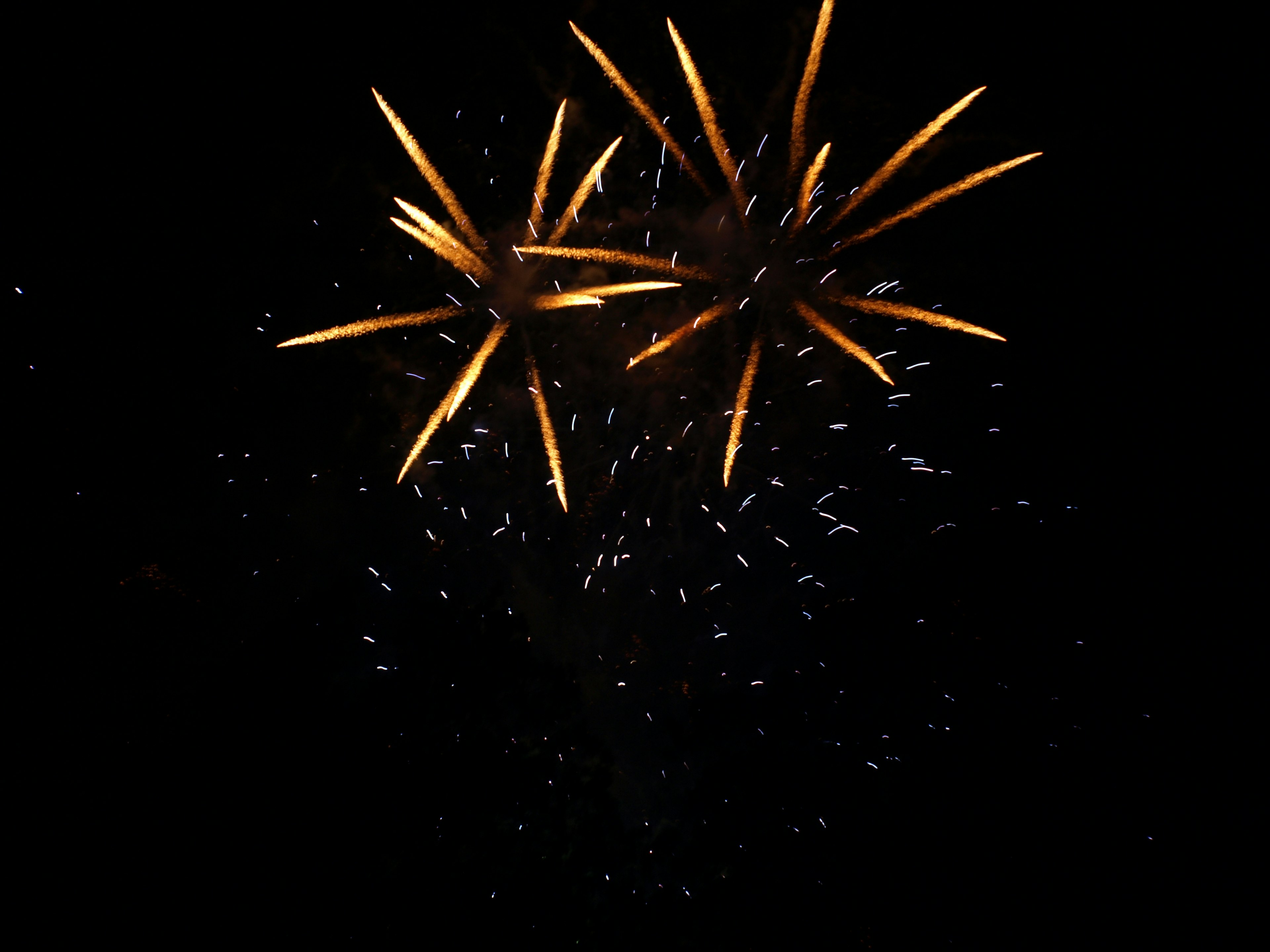 Sparkling fireworks explosion with a black background