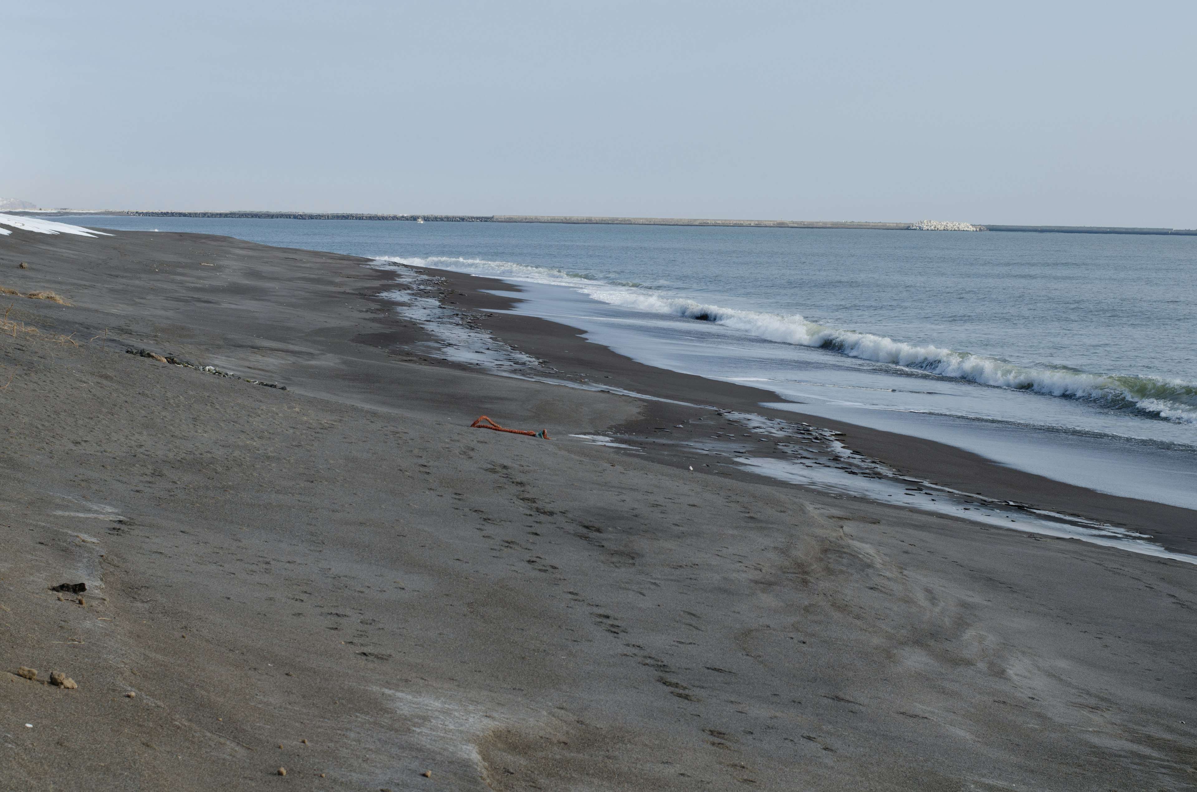 Scenic view of a calm beach shoreline