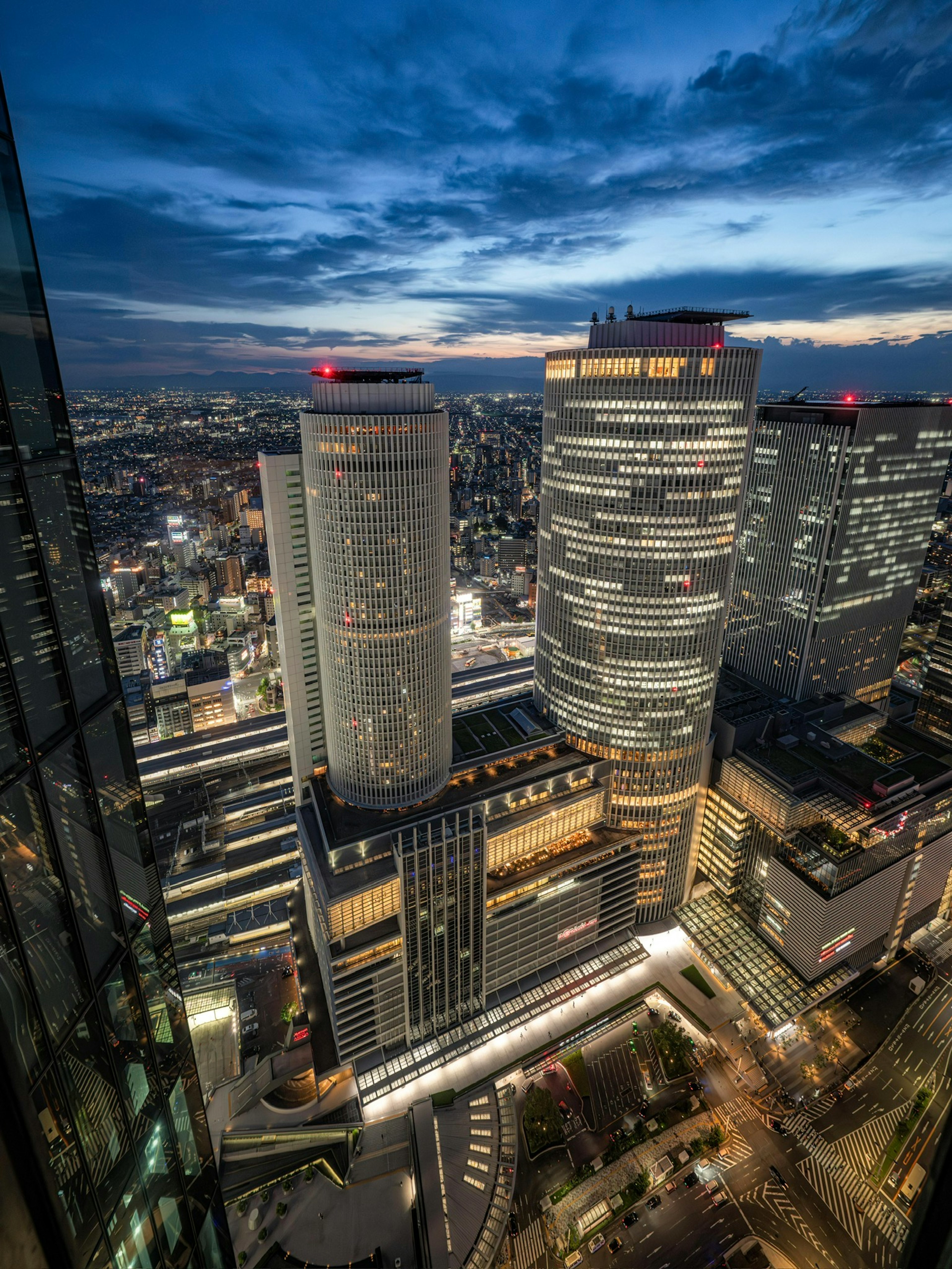 Night view of city skyline with towering skyscrapers