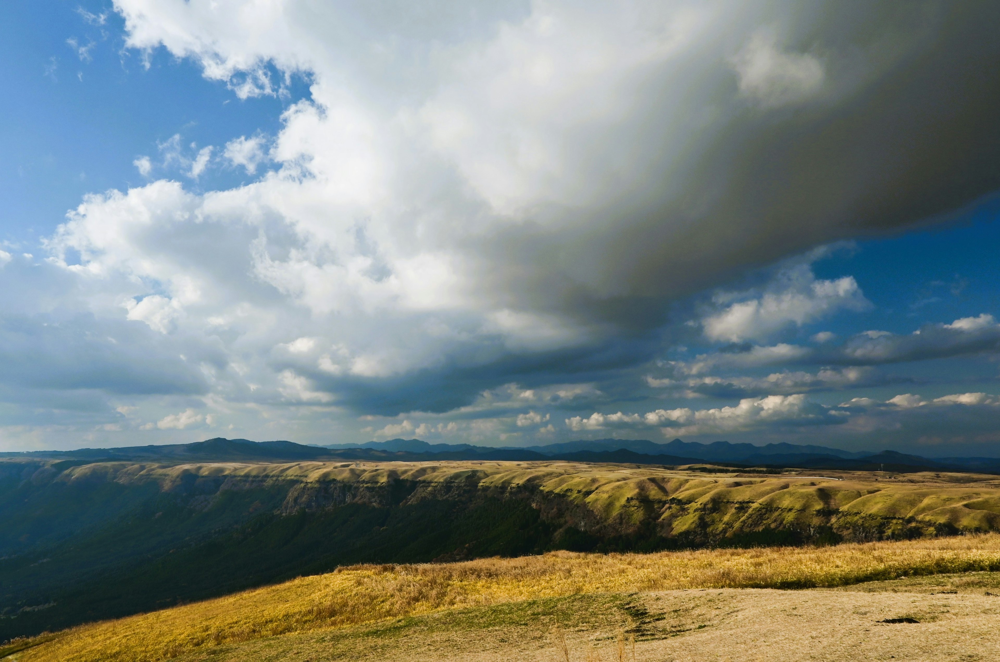 Mountain landscape with clouds and blue sky