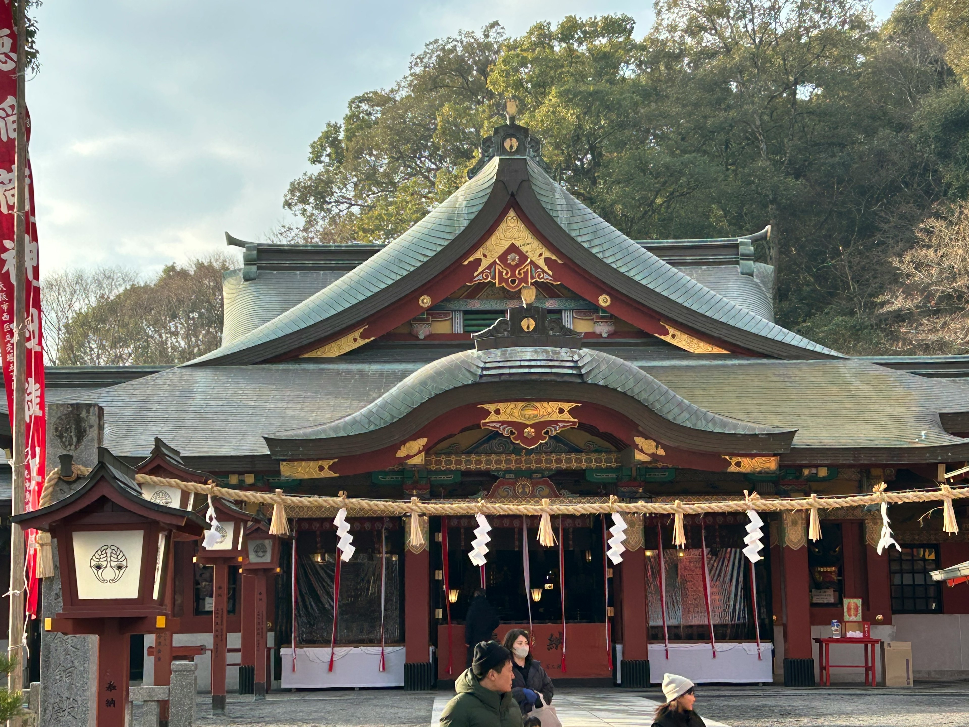 Traditional shrine architecture featuring ornate roof and decorative elements