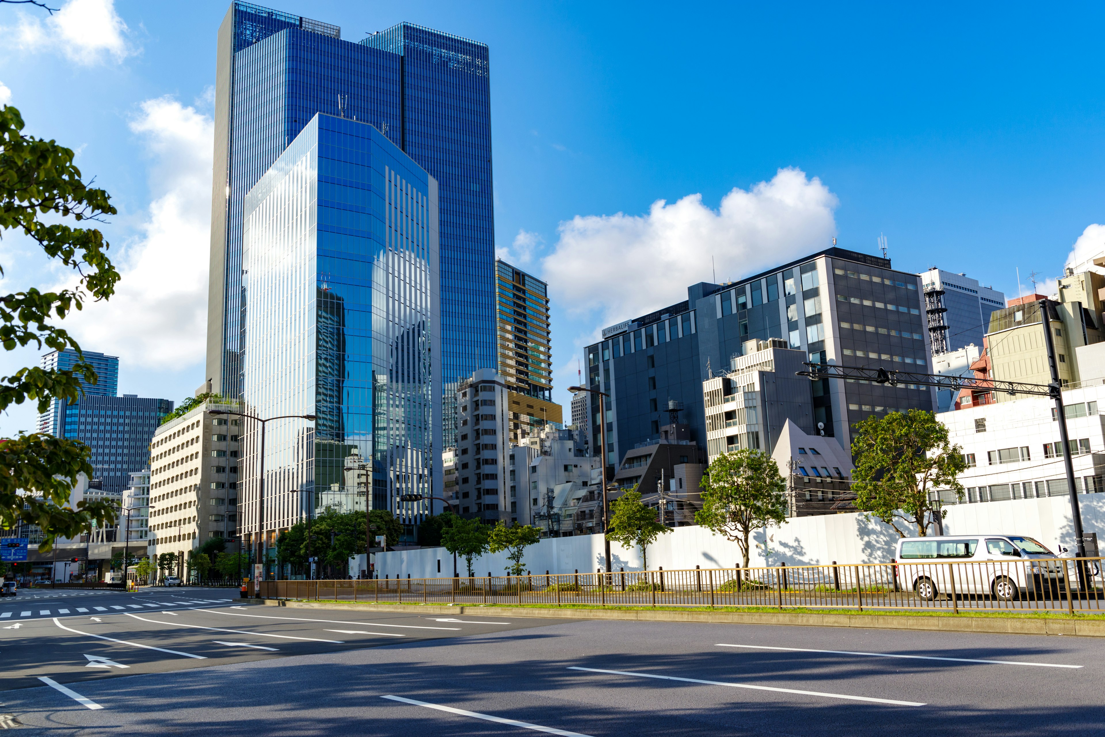 Cityscape featuring skyscrapers and a clear blue sky