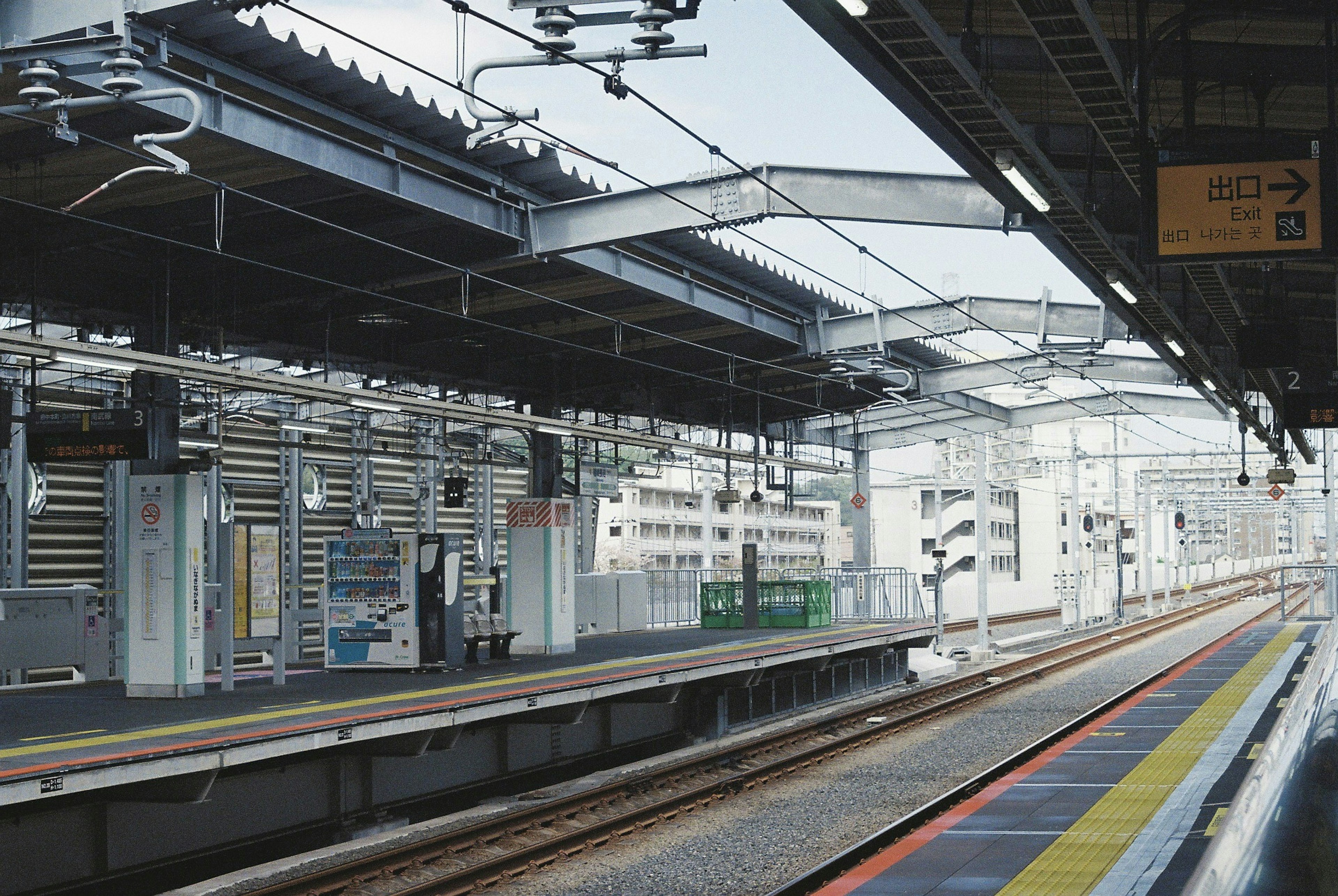 Modern train station platform with roof structure