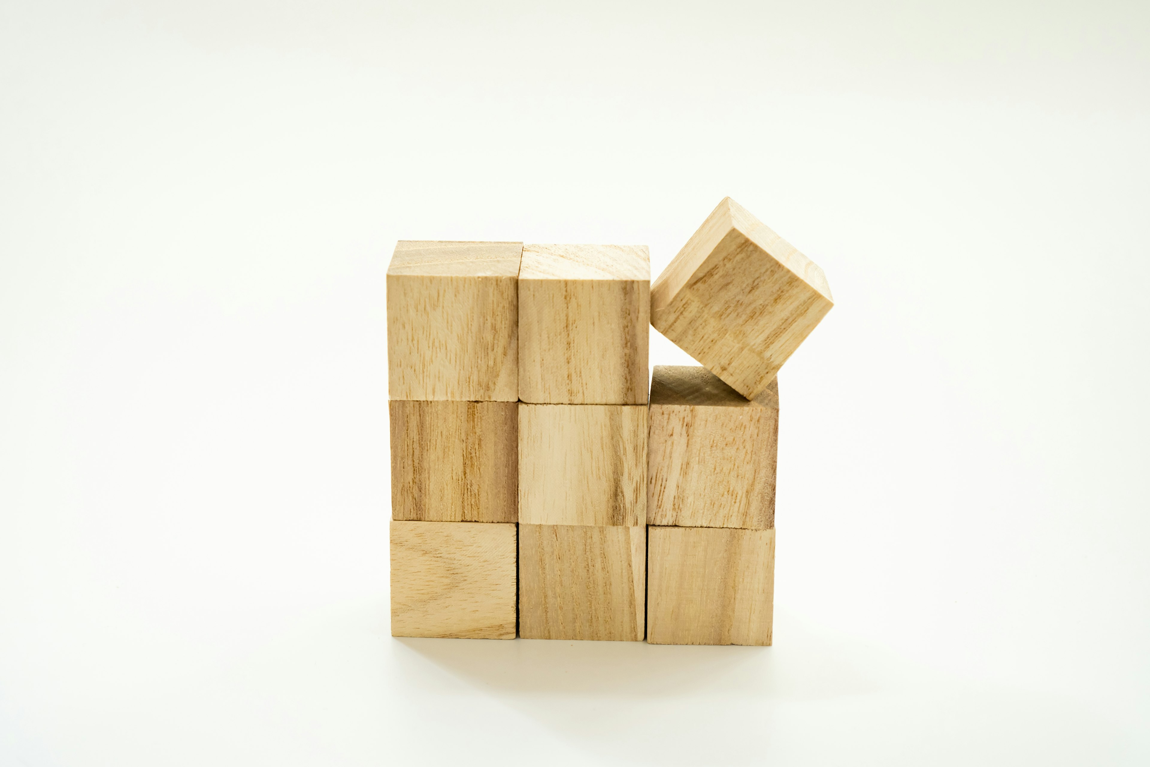 Image of stacked wooden blocks in a unique arrangement