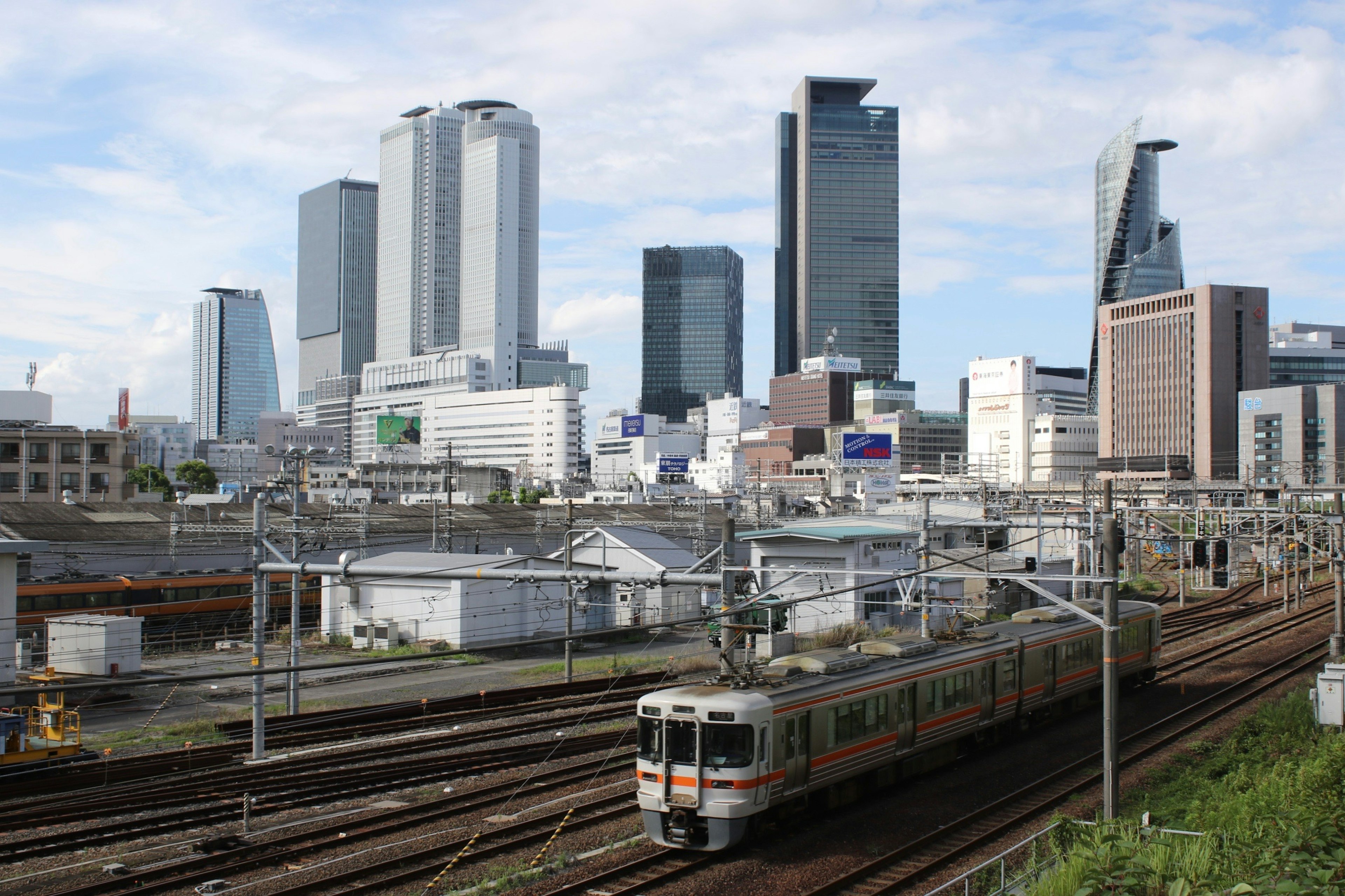 Urban landscape featuring skyscrapers and railway