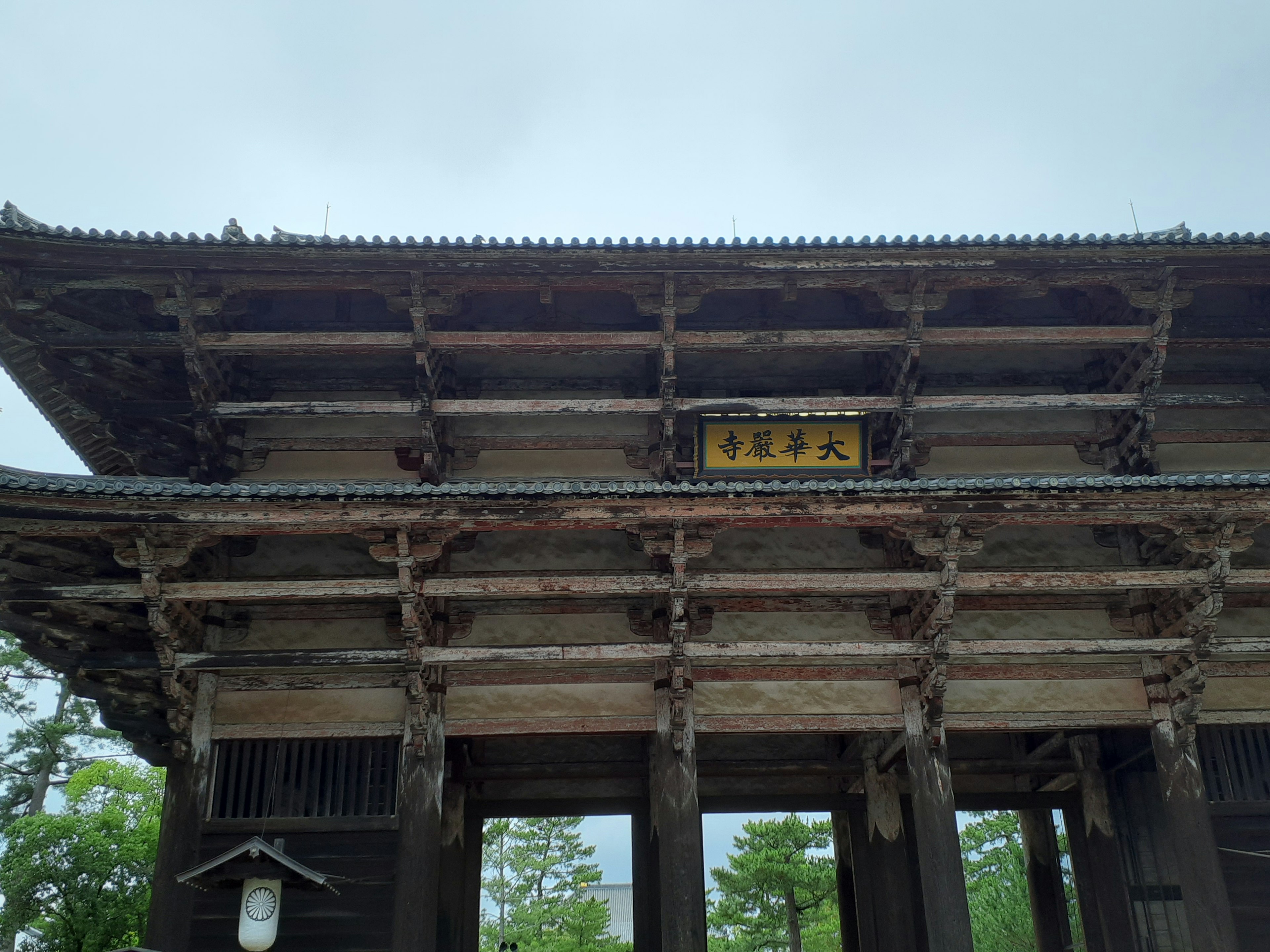 Traditional Japanese gate structure with wooden details