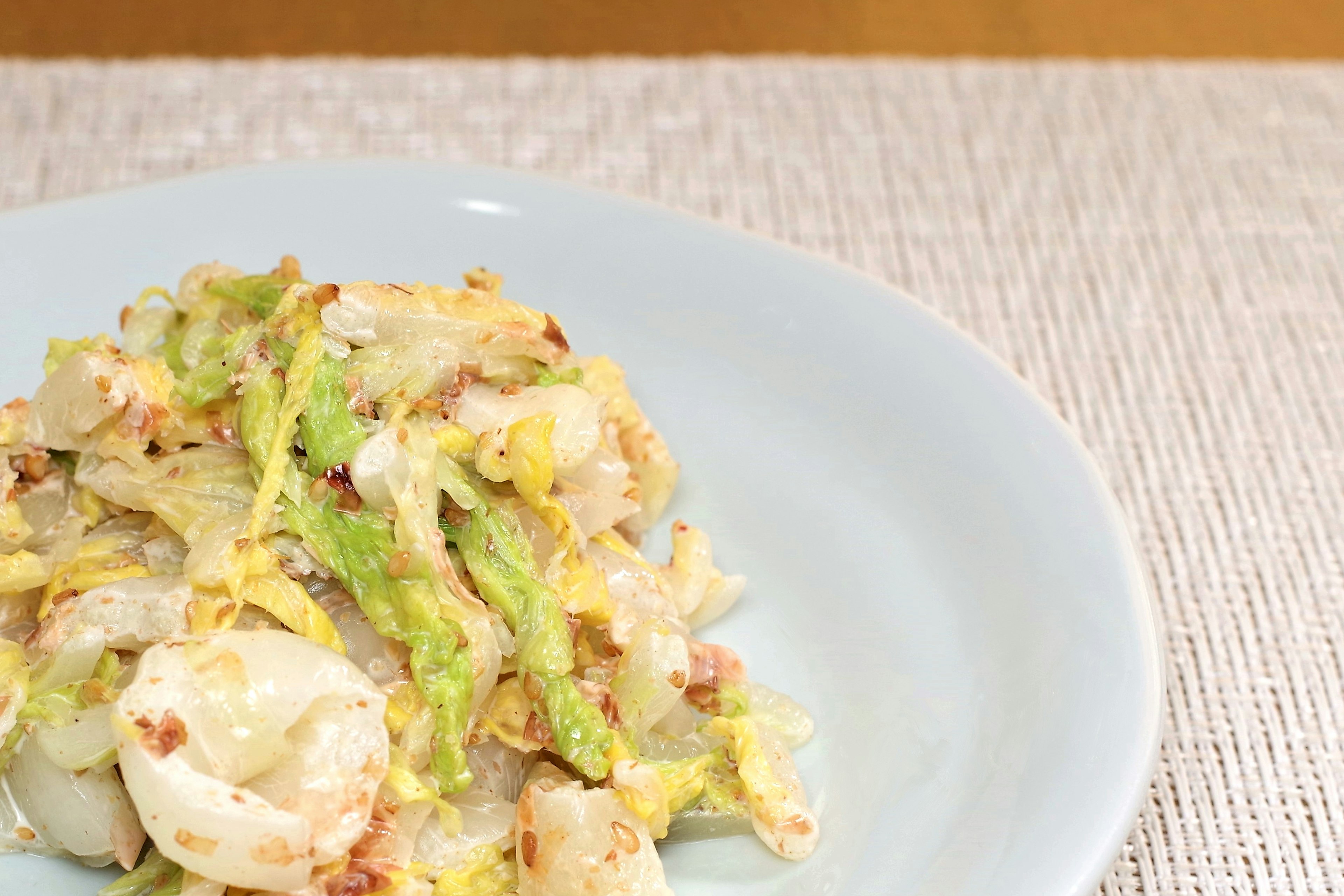 Stir-fried cabbage with shrimp served on a plate