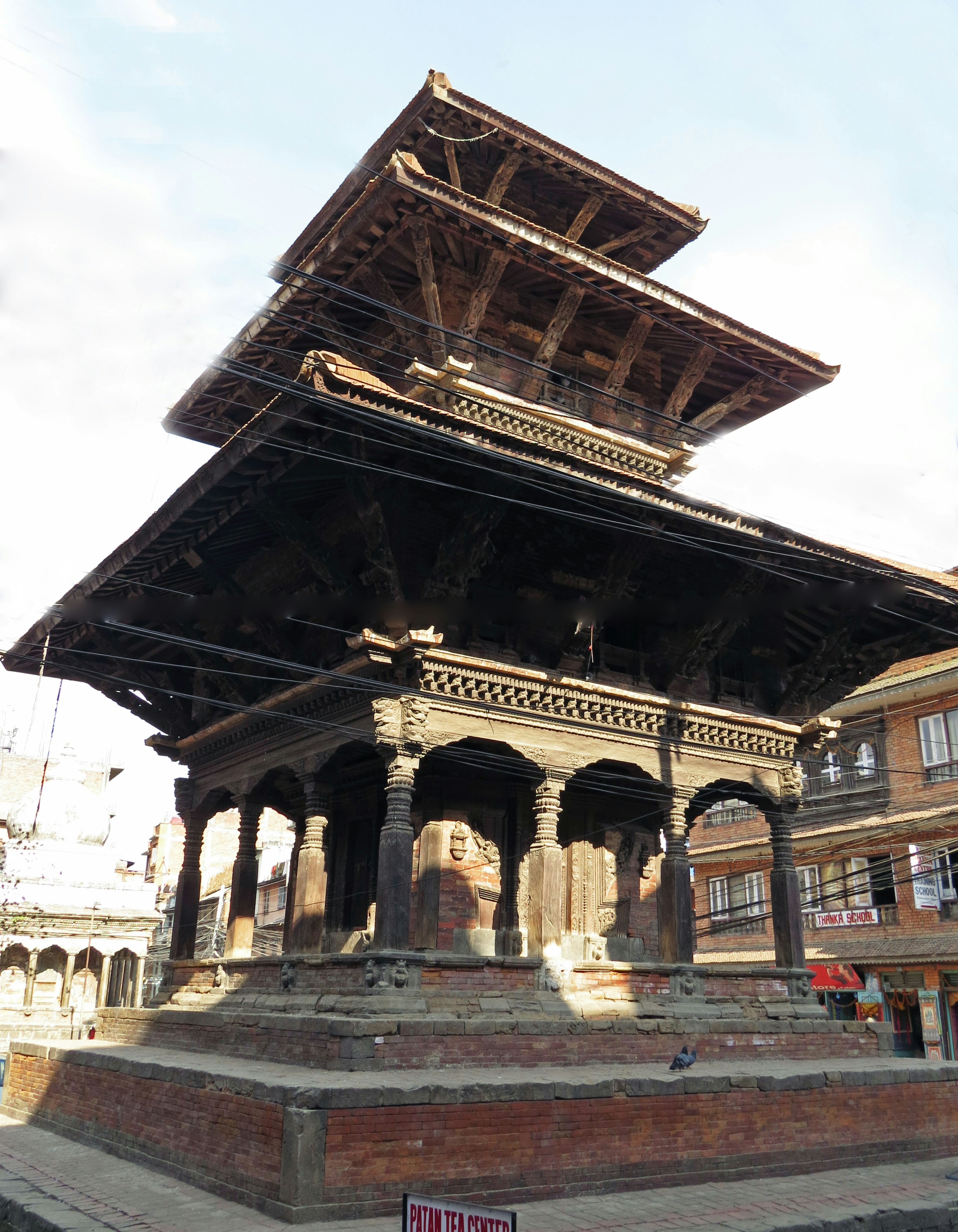 Traditional three-tiered temple structure in Nepal