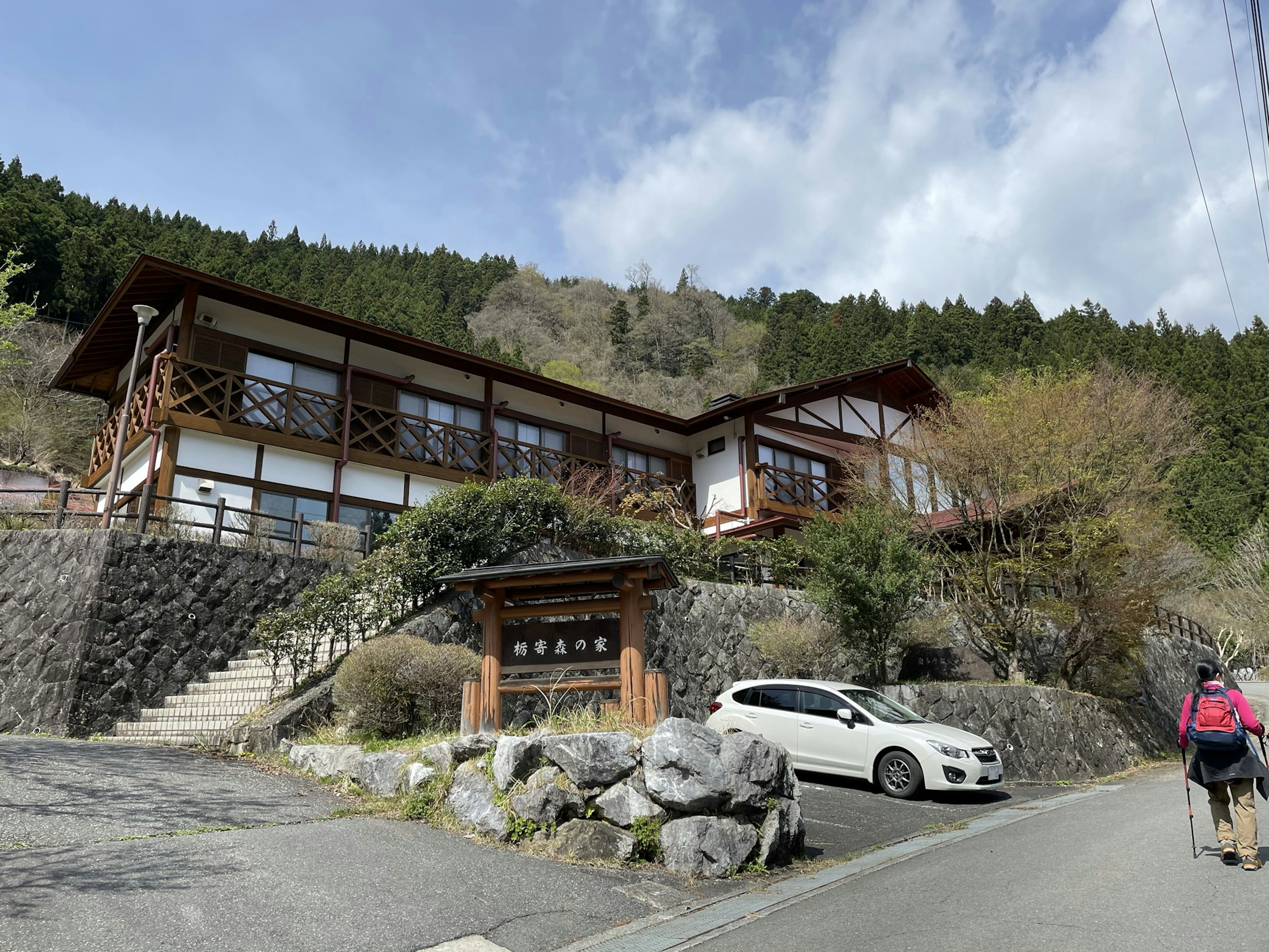 Traditional Japanese building in the mountains with stone steps