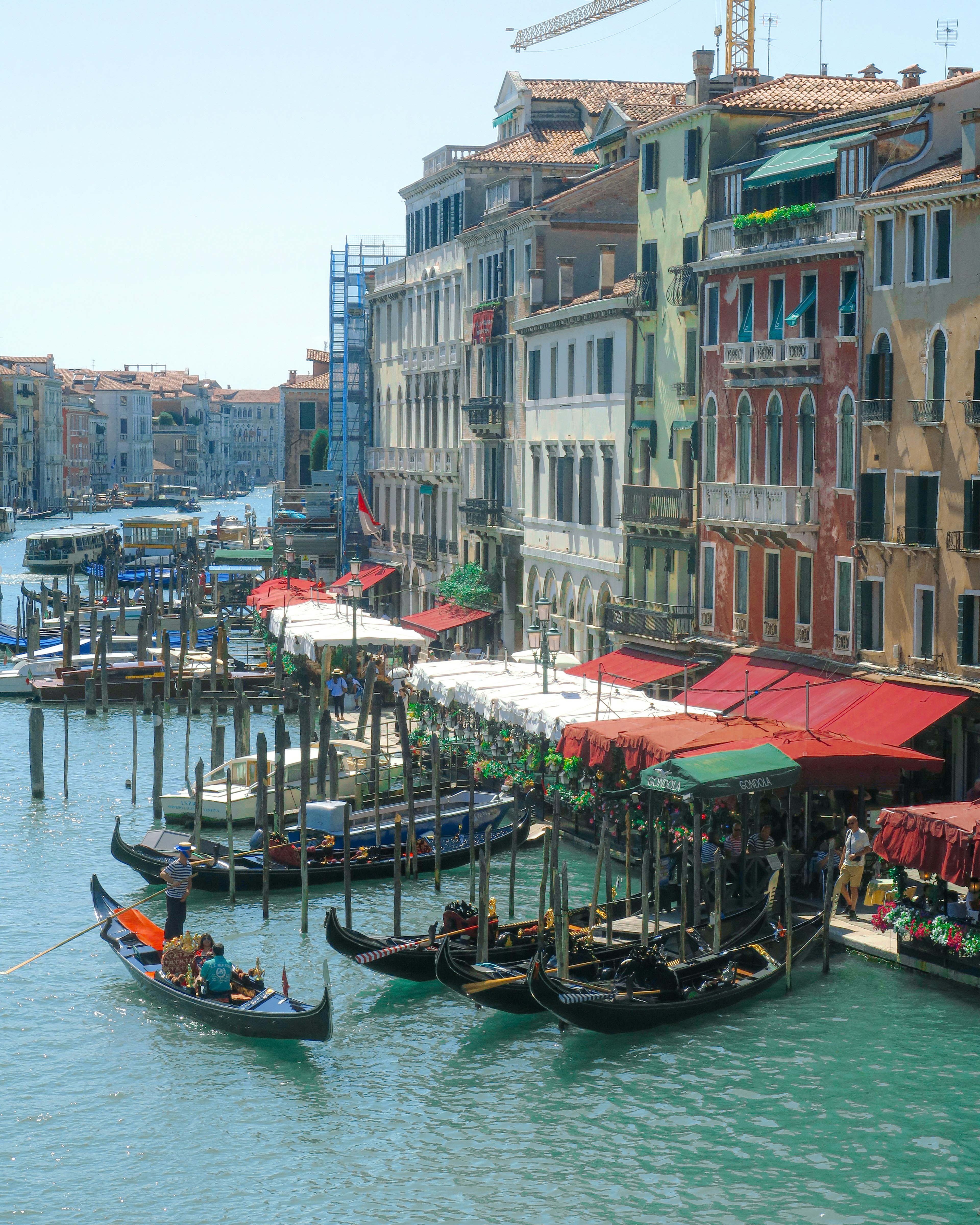 Colorful buildings and gondolas along the canal in Venice