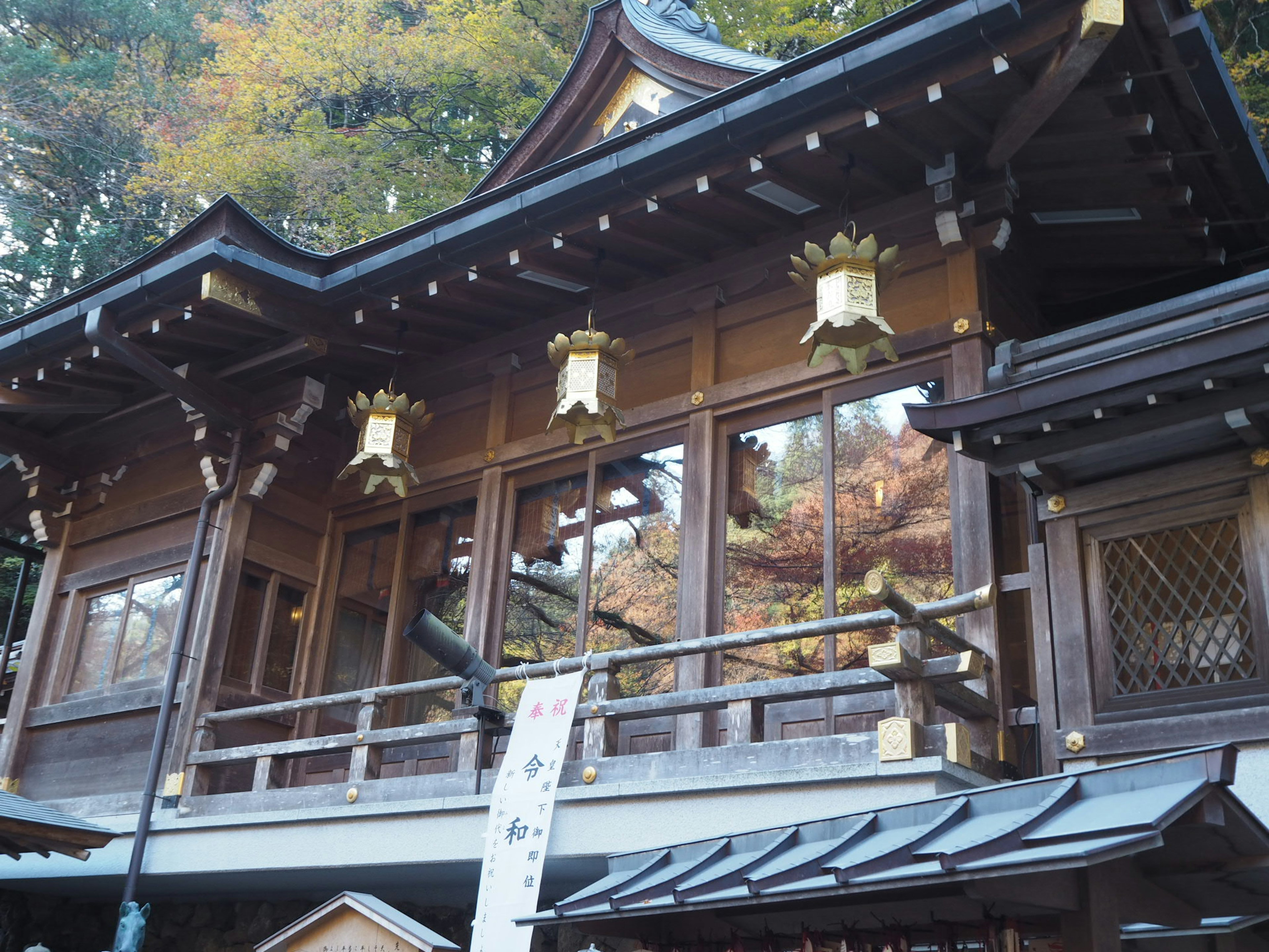 Beautiful wooden shrine architecture with windows and decorative lanterns