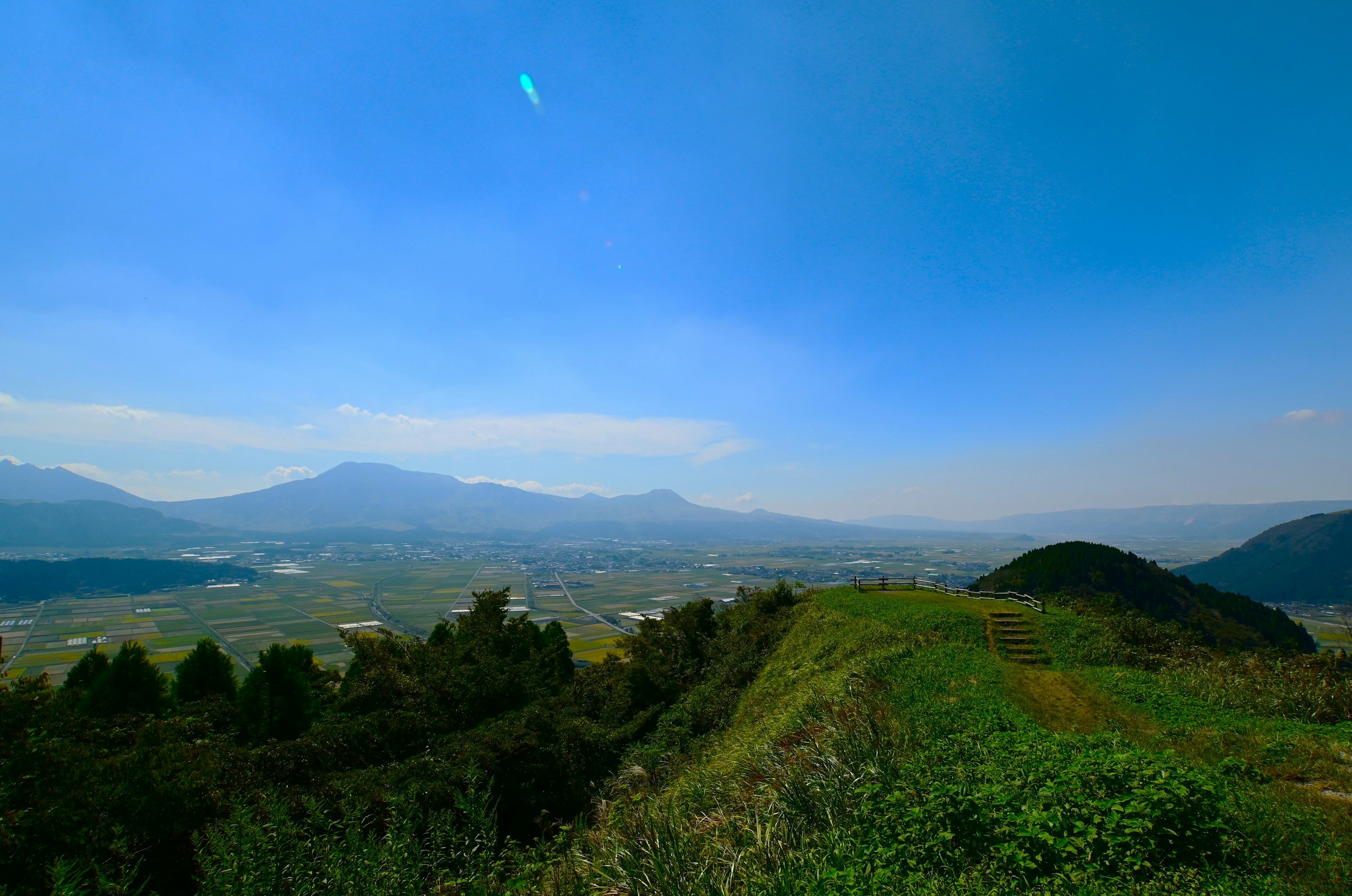 Beautiful landscape with blue sky and distant mountains