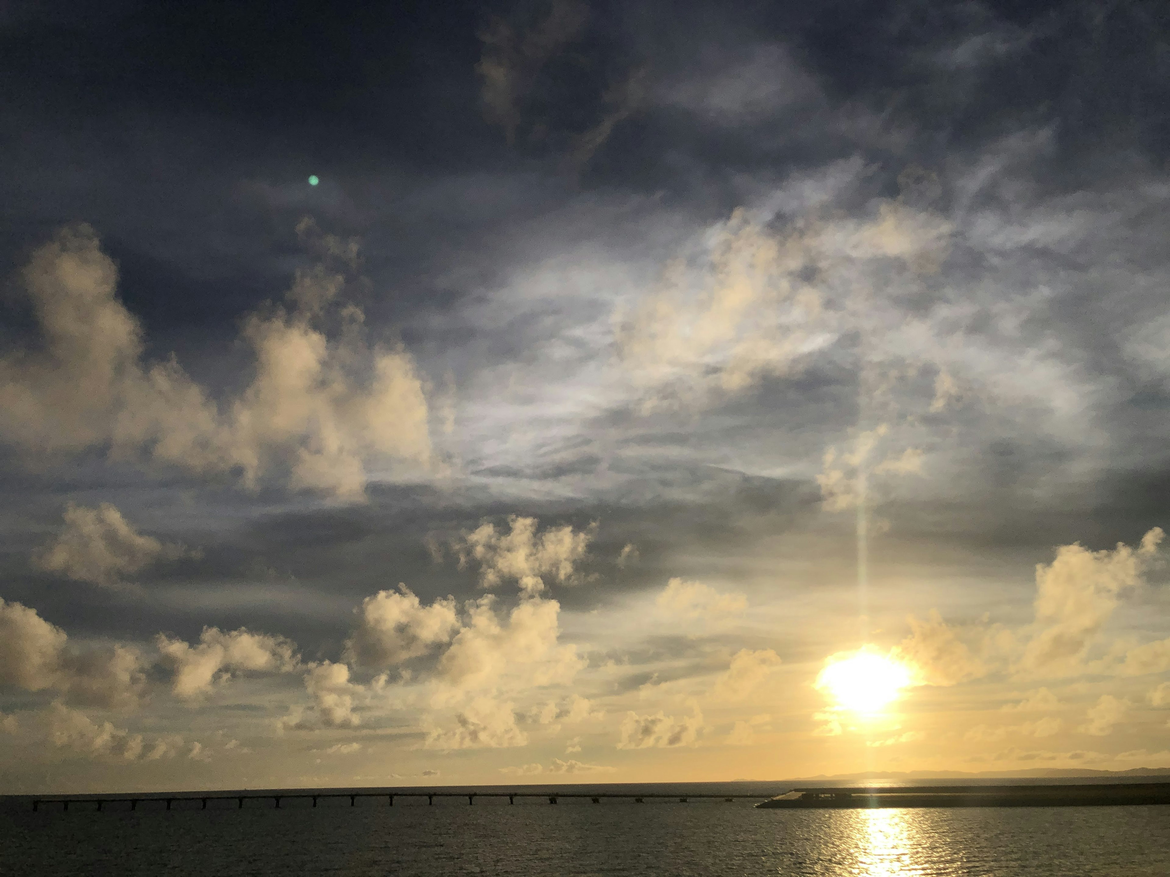 Beautiful sunset over the ocean with clouds