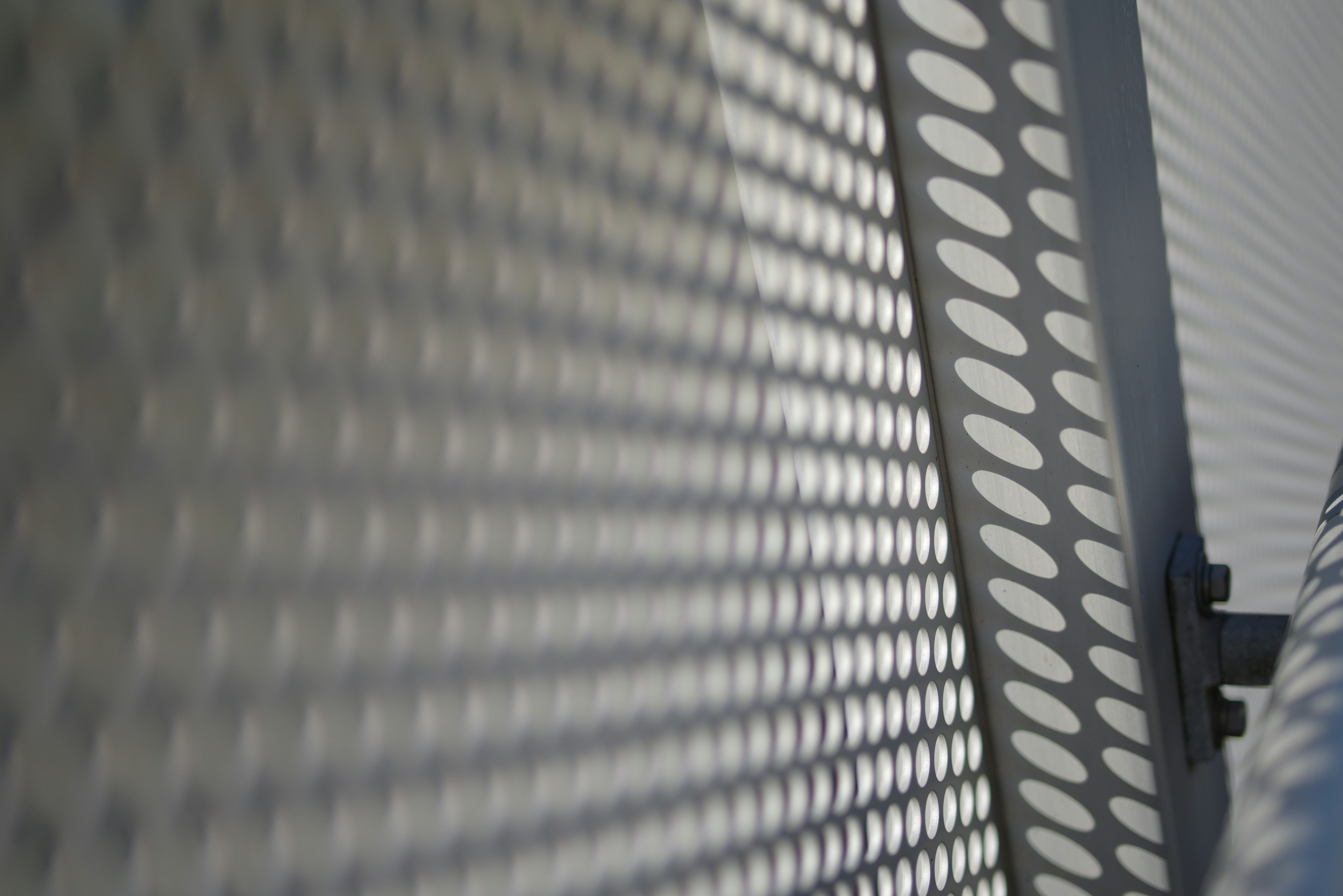 Image showing a textured metal mesh with light and shadow patterns