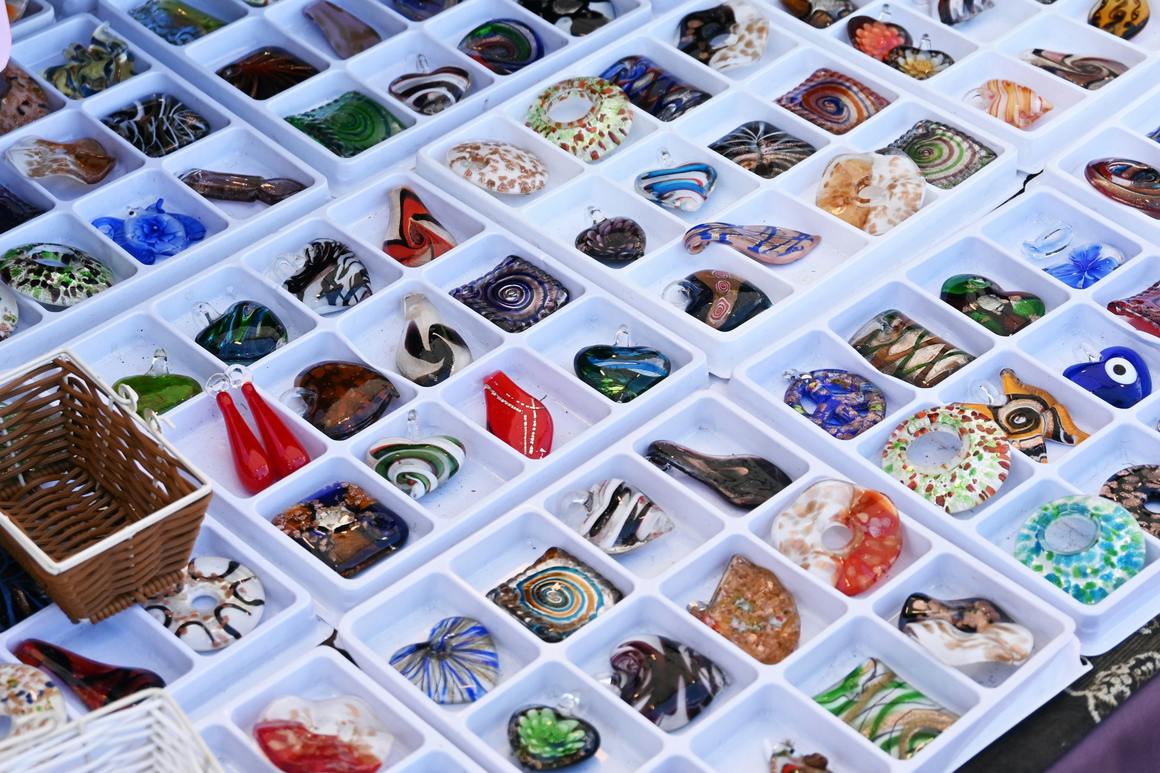 Colorful glass crafts displayed at a market