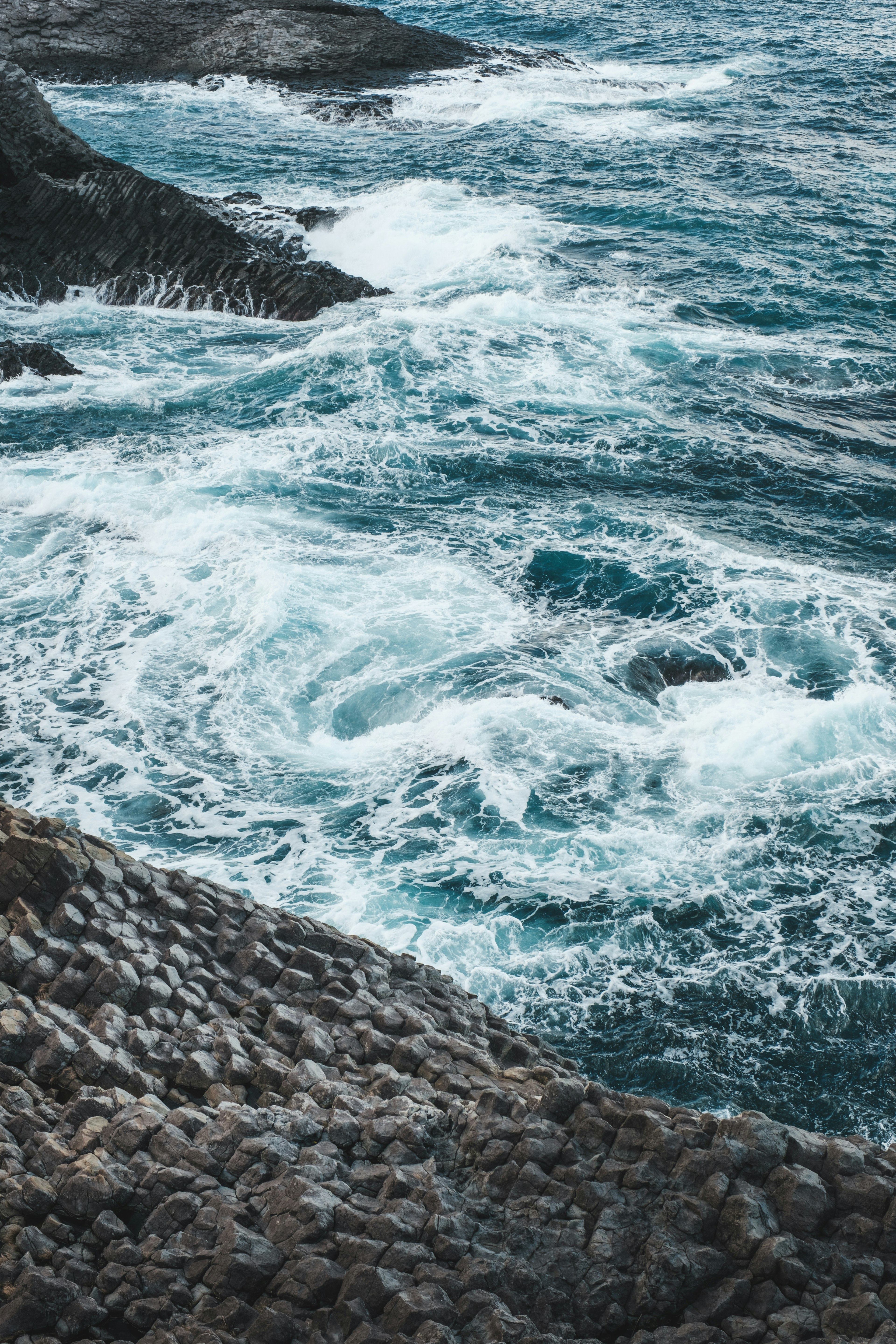 Waves crashing against rocky shore