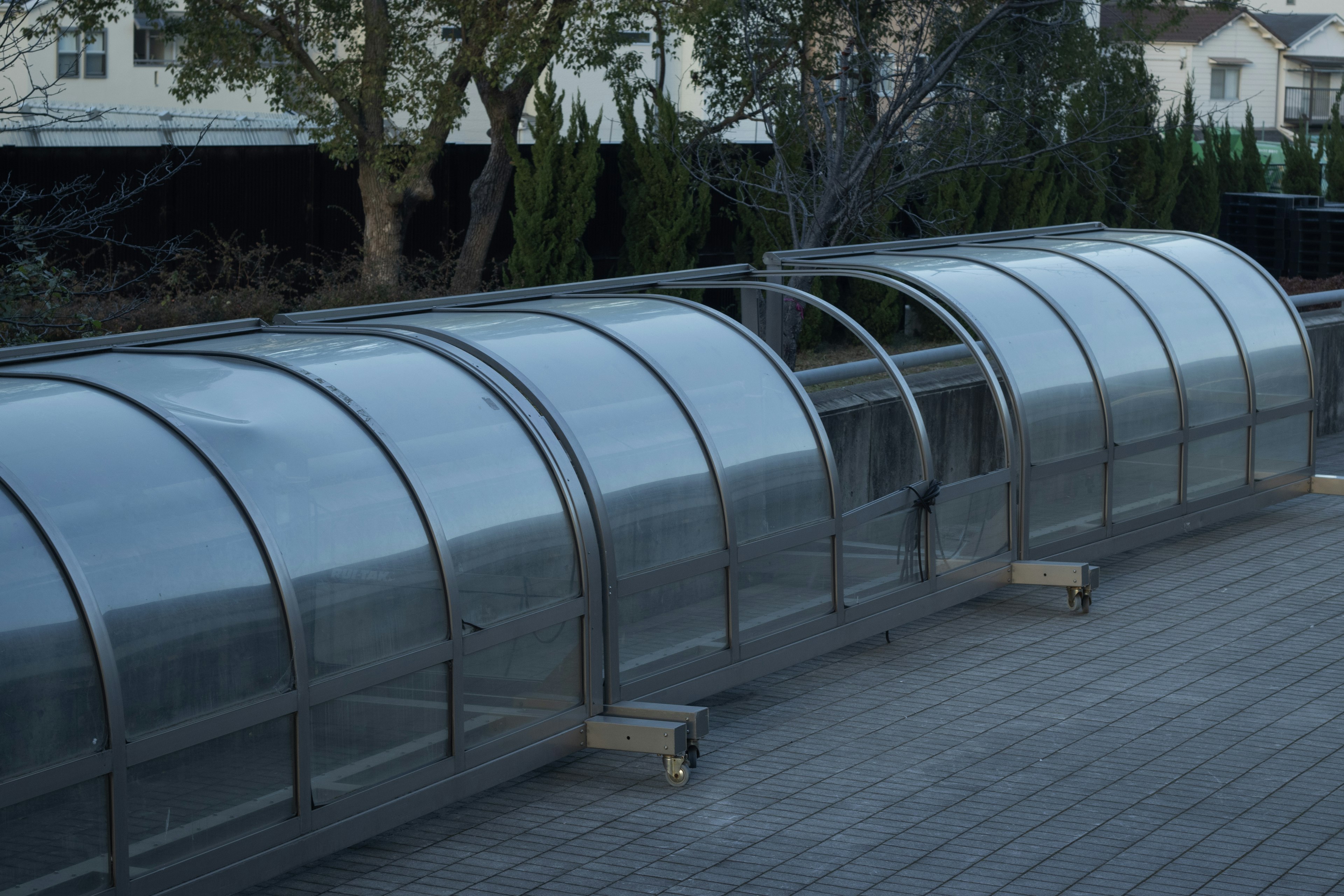 Row of transparent arch-shaped roofs