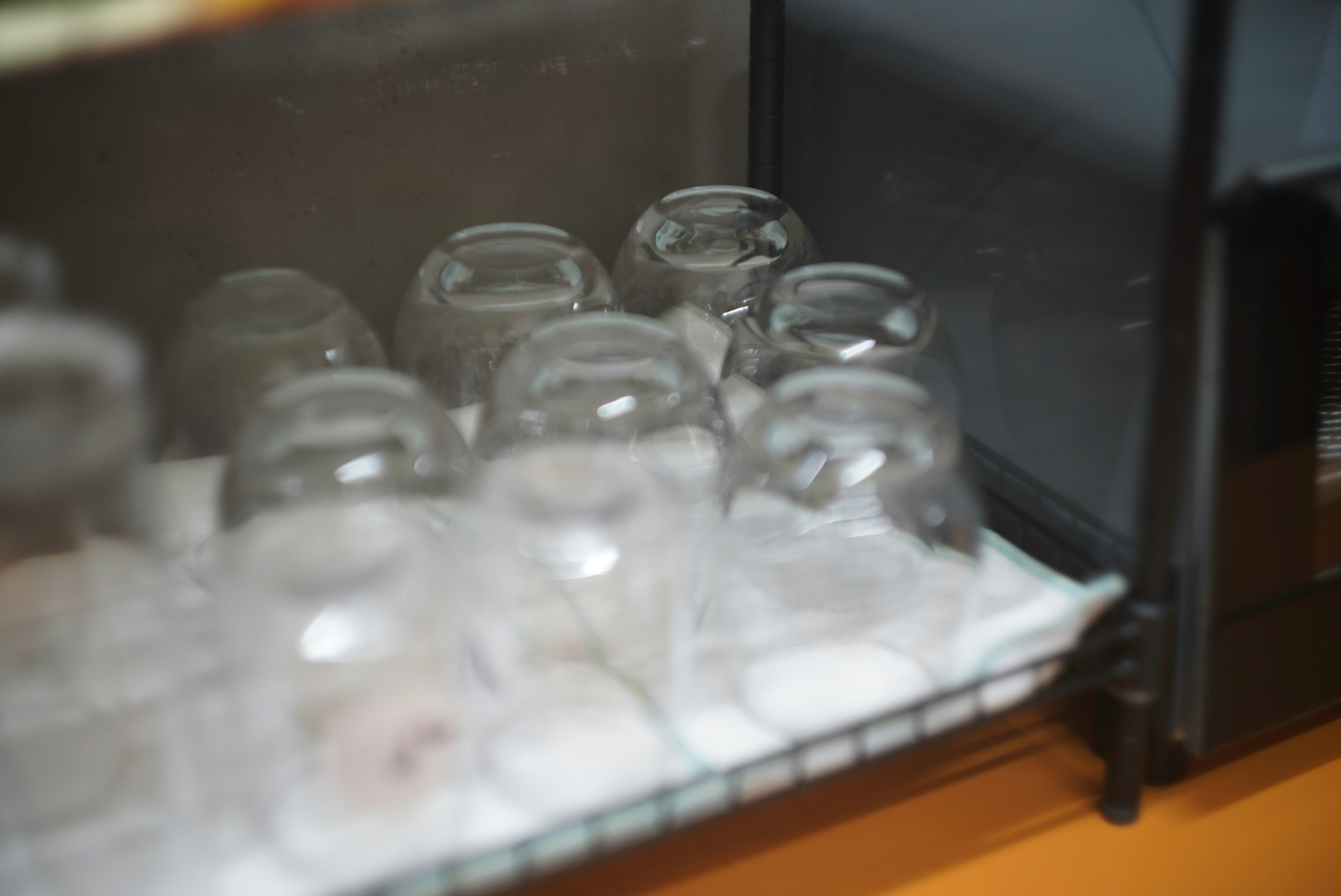 Interior of a shelf with glass jars arranged