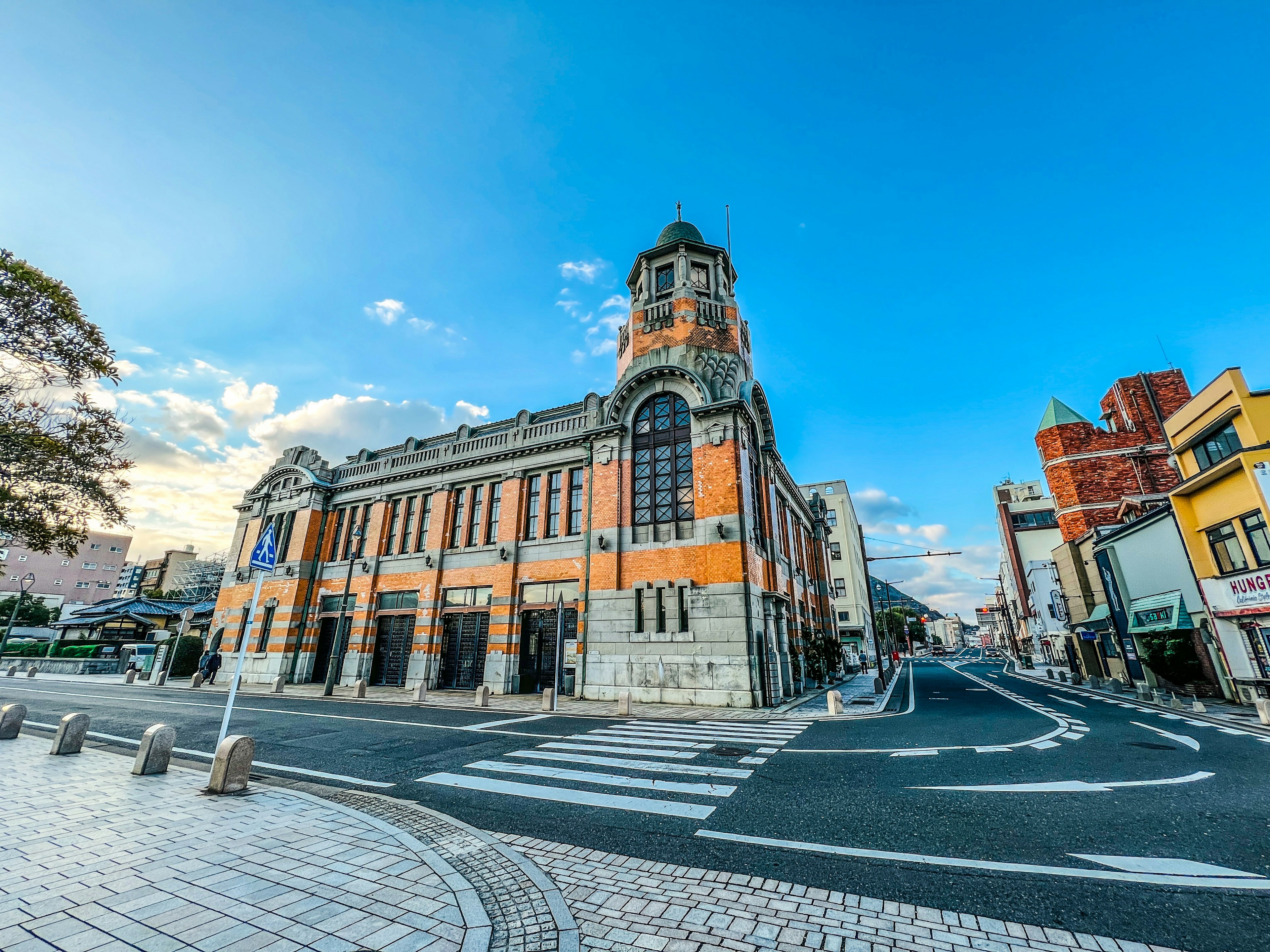 Historic building with distinctive architecture under a clear blue sky