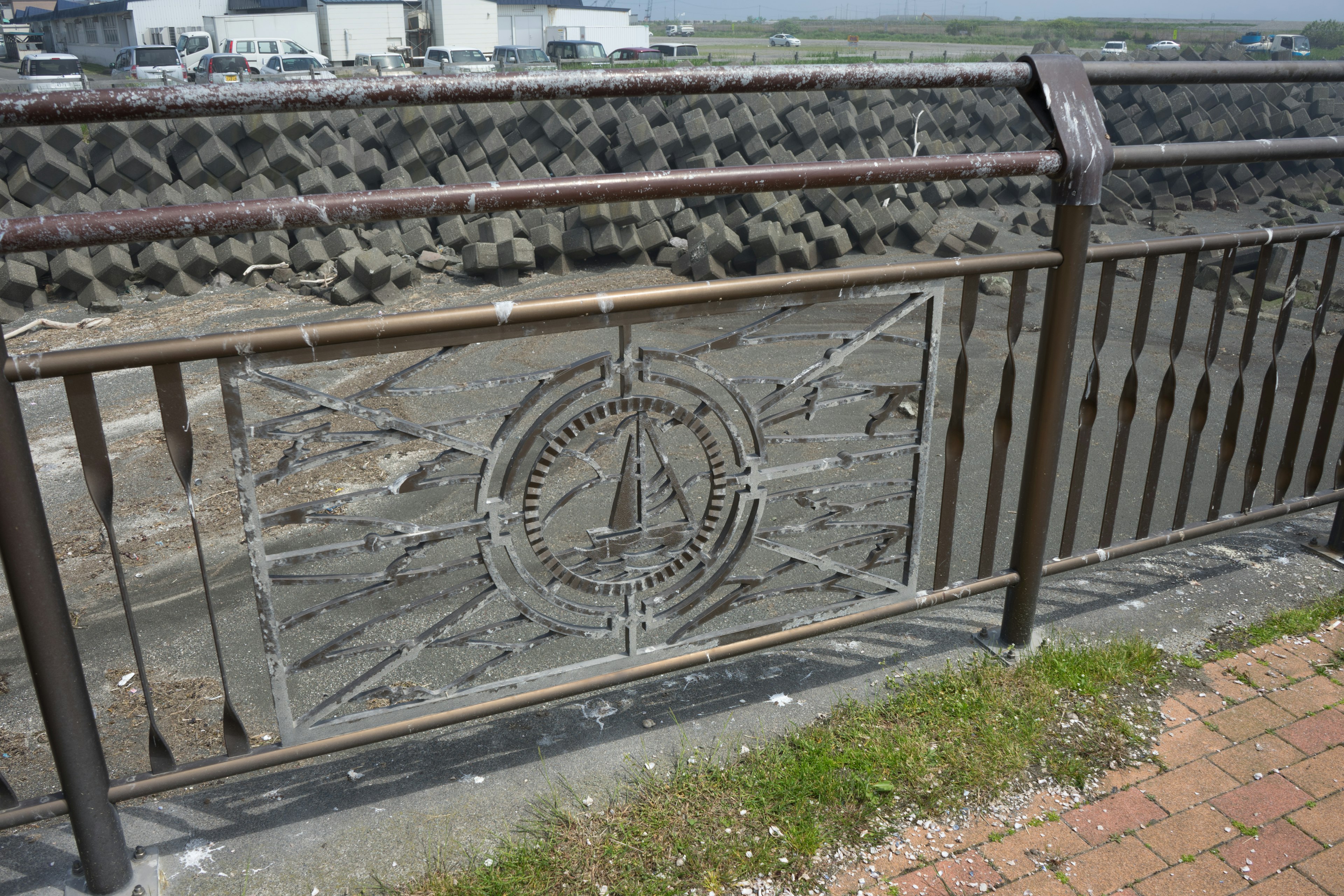 Decorative metal railing featuring a compass design