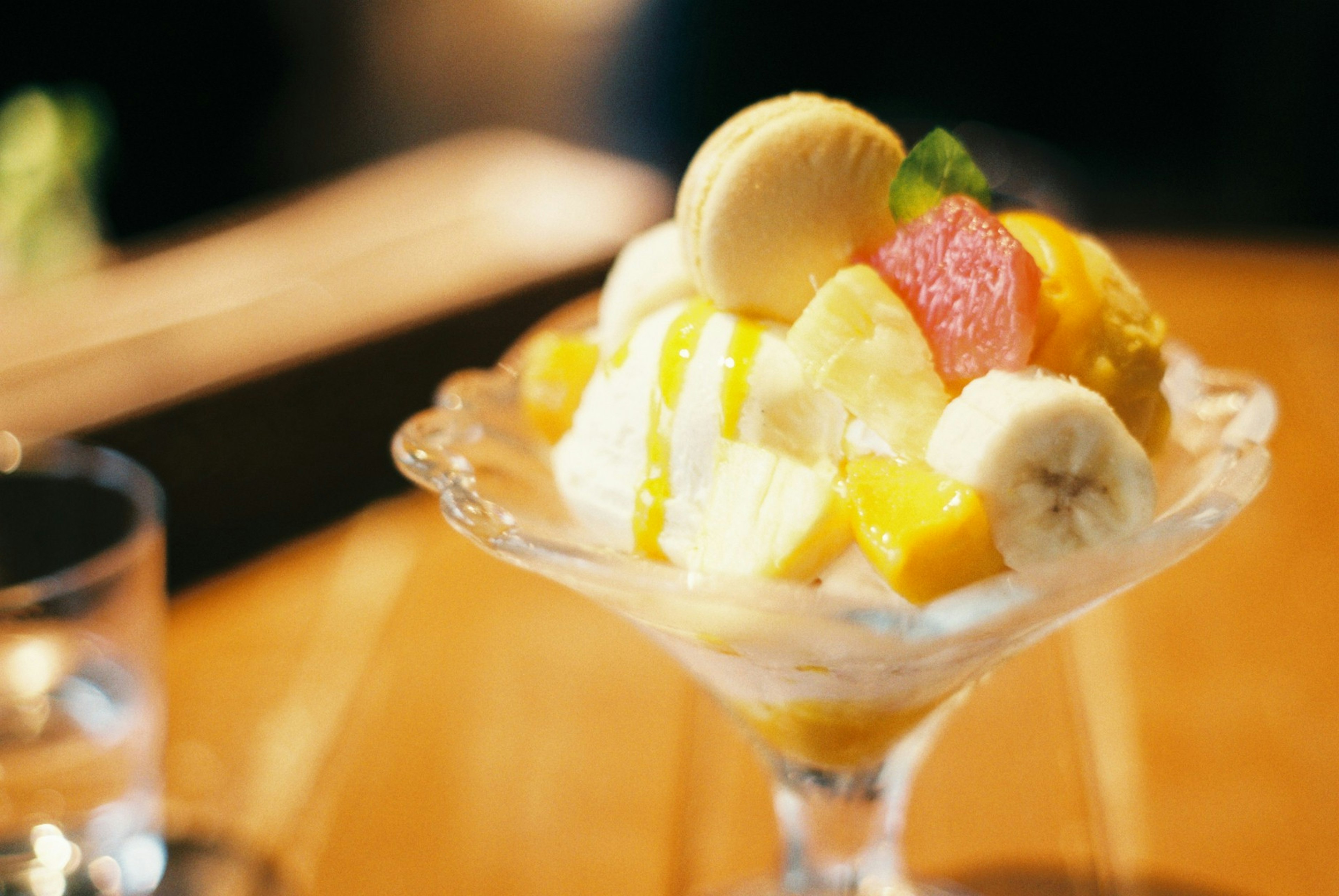 Dessert cup with fruits and ice cream