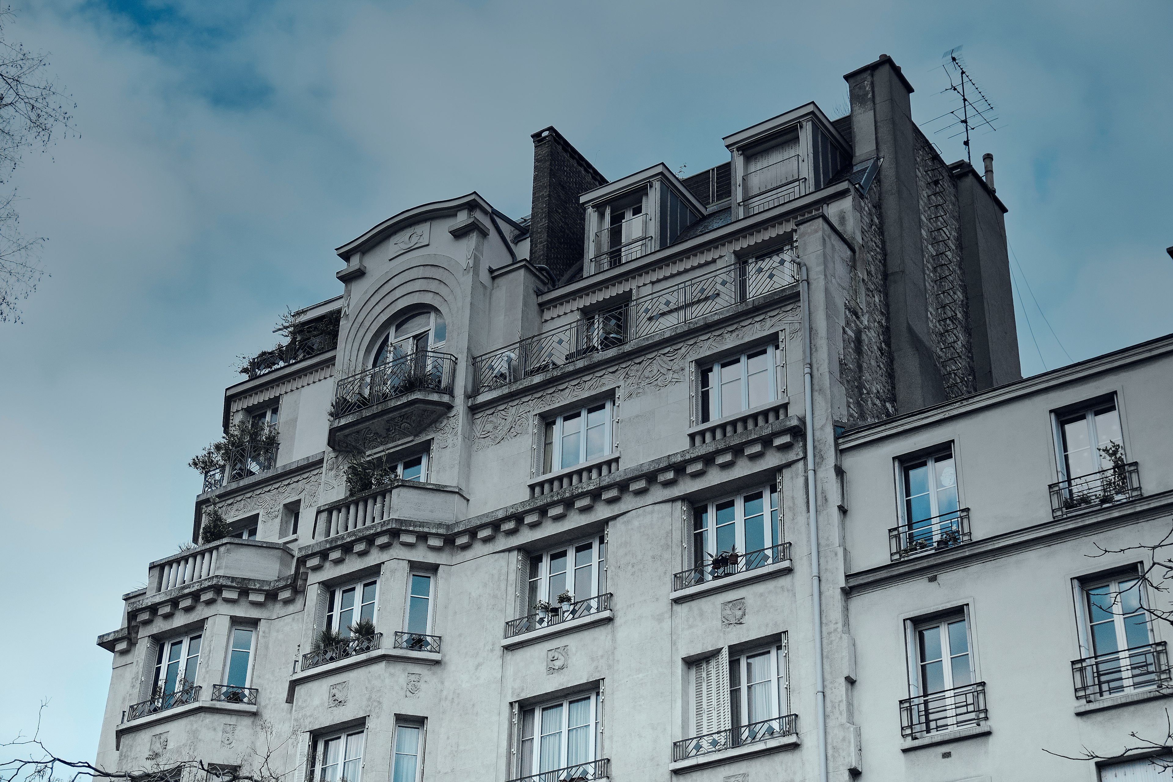 Gray building under a blue sky