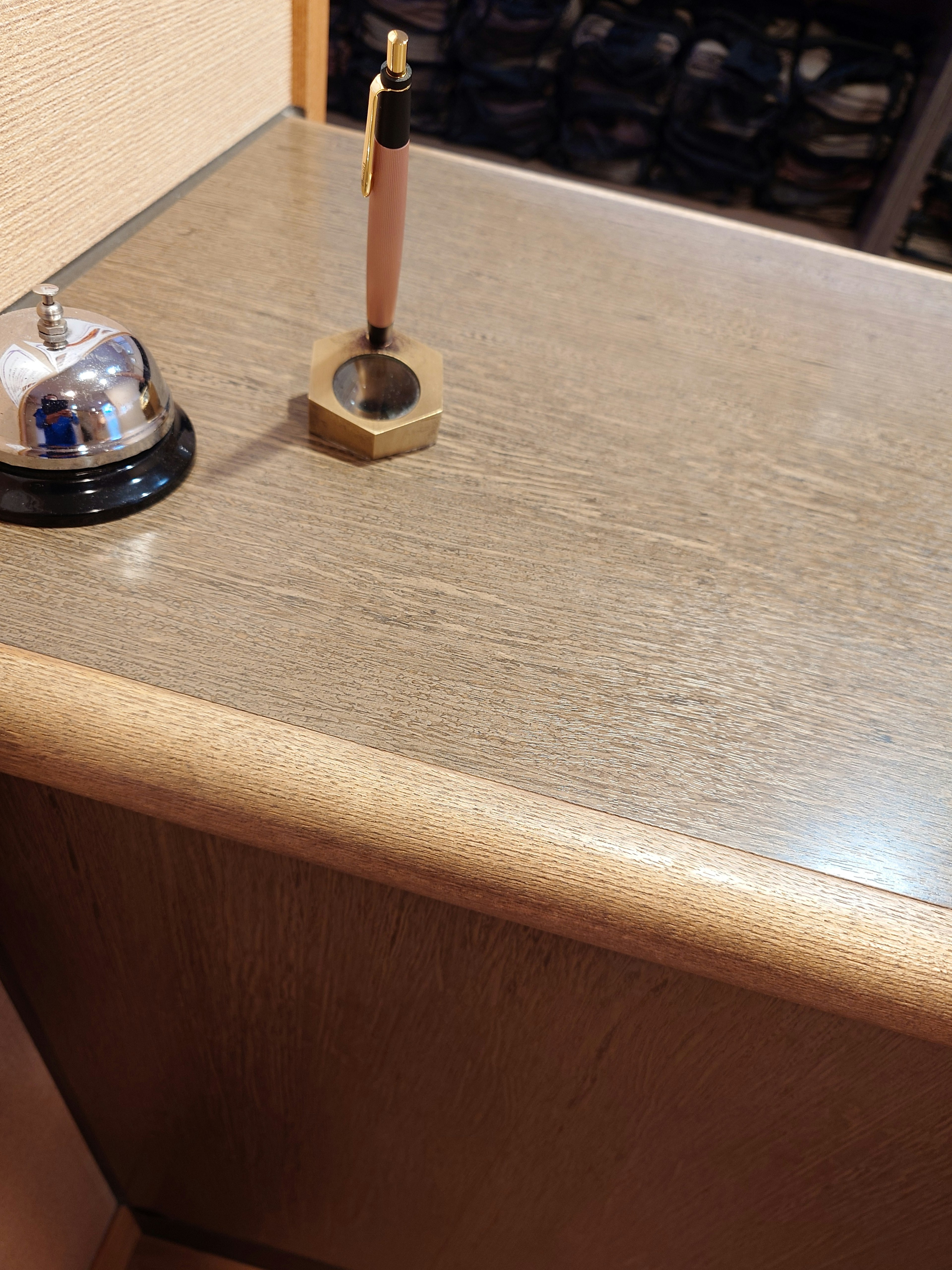 Desk with a bell and a pen holder