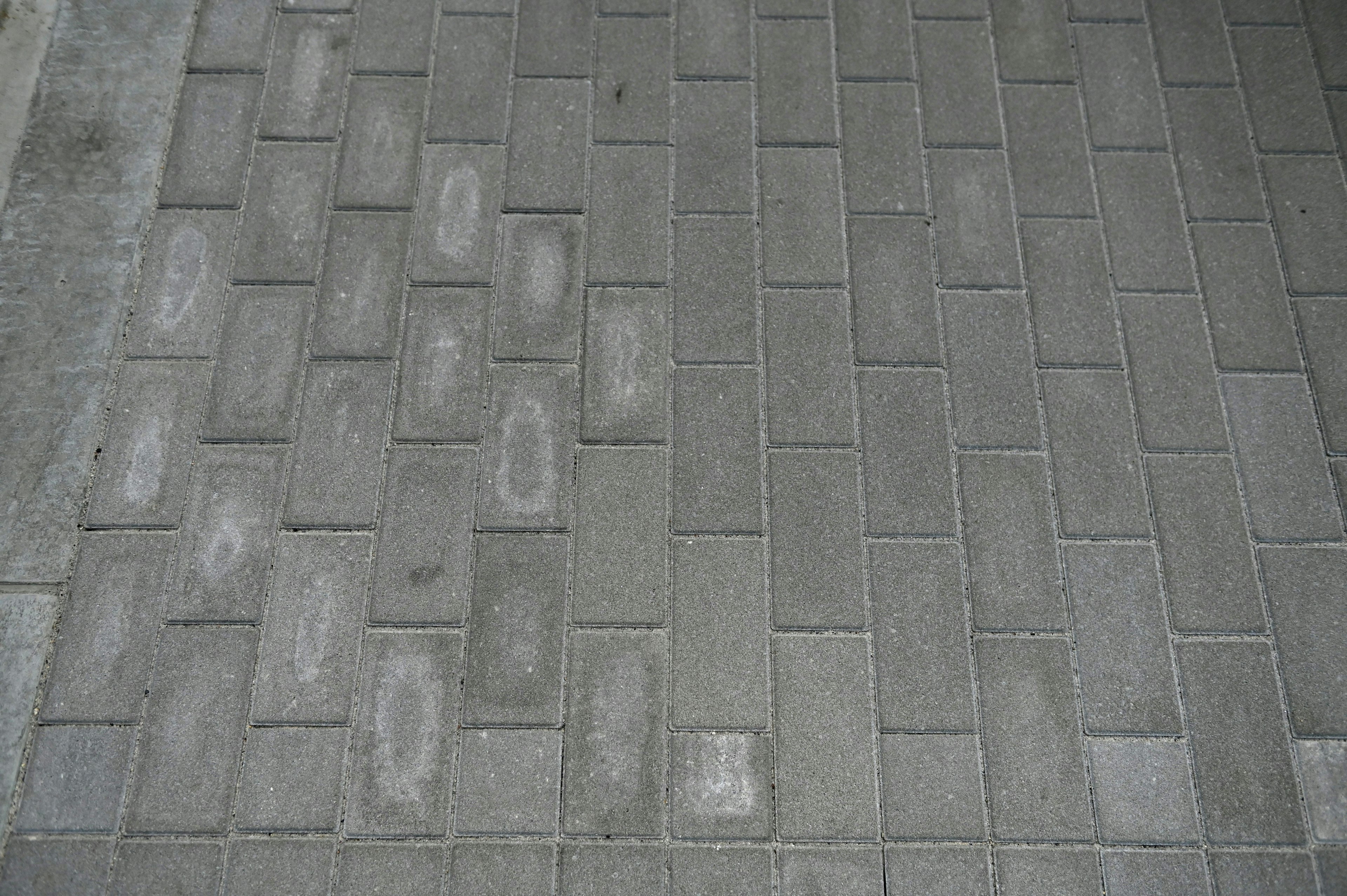 Paved brick pattern with varying shades and textures