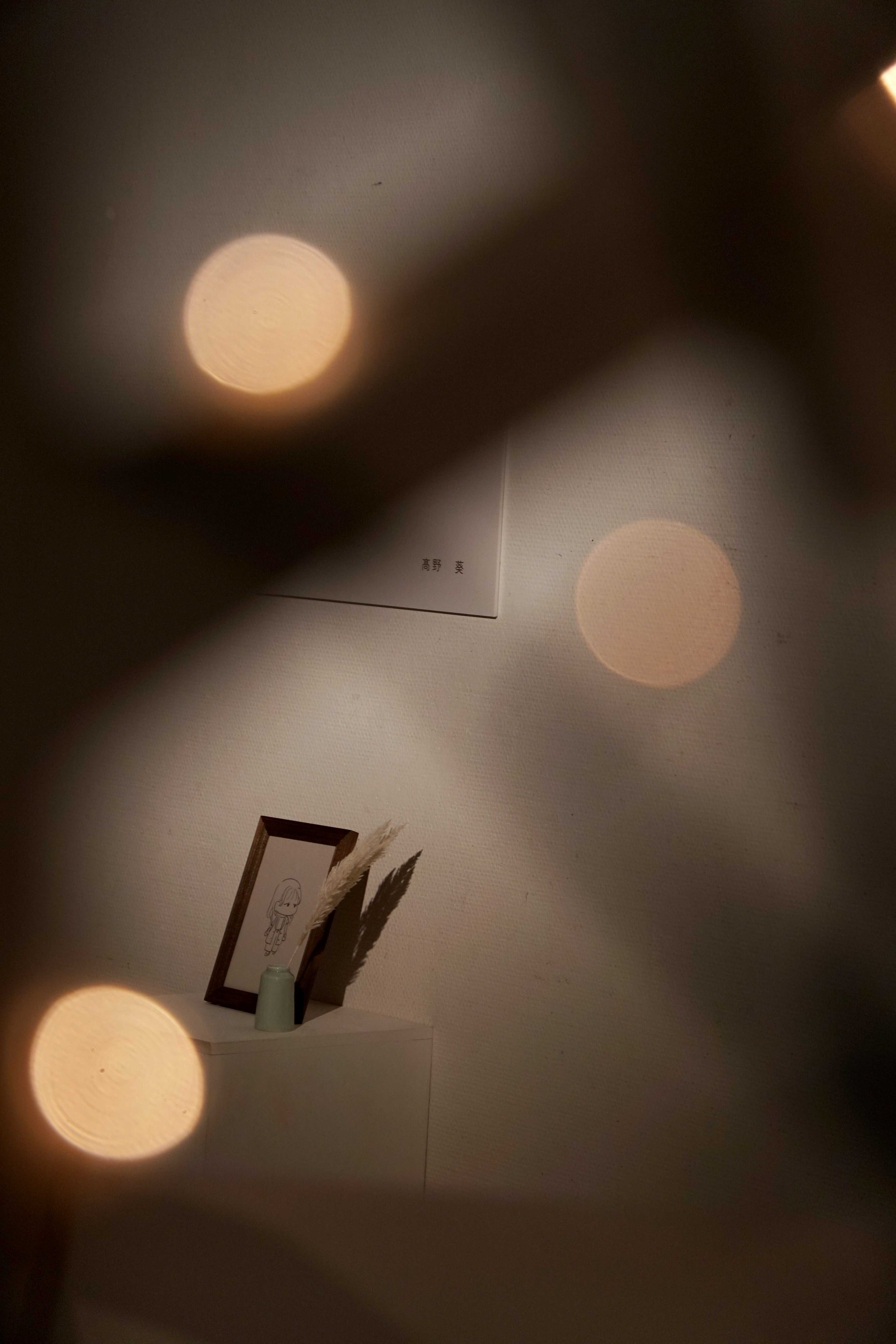 A blurred background featuring an open book with visible pages