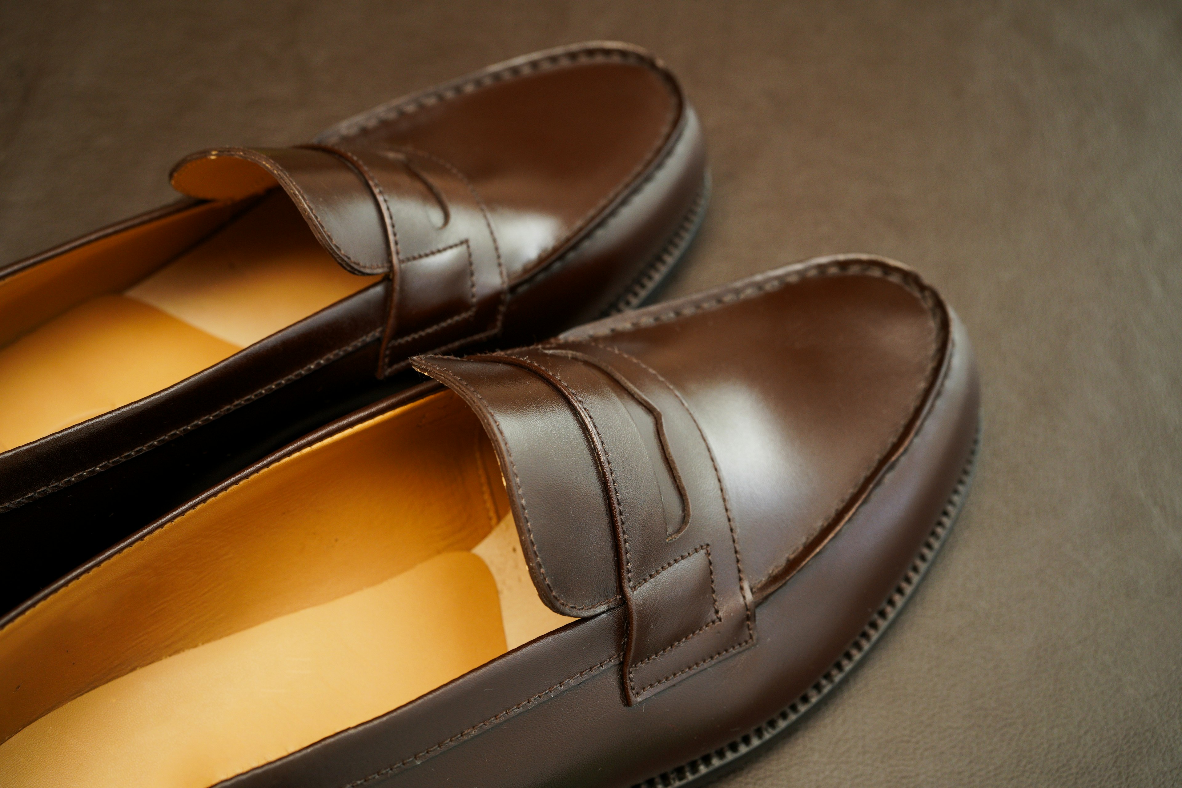 Close-up of brown leather loafers