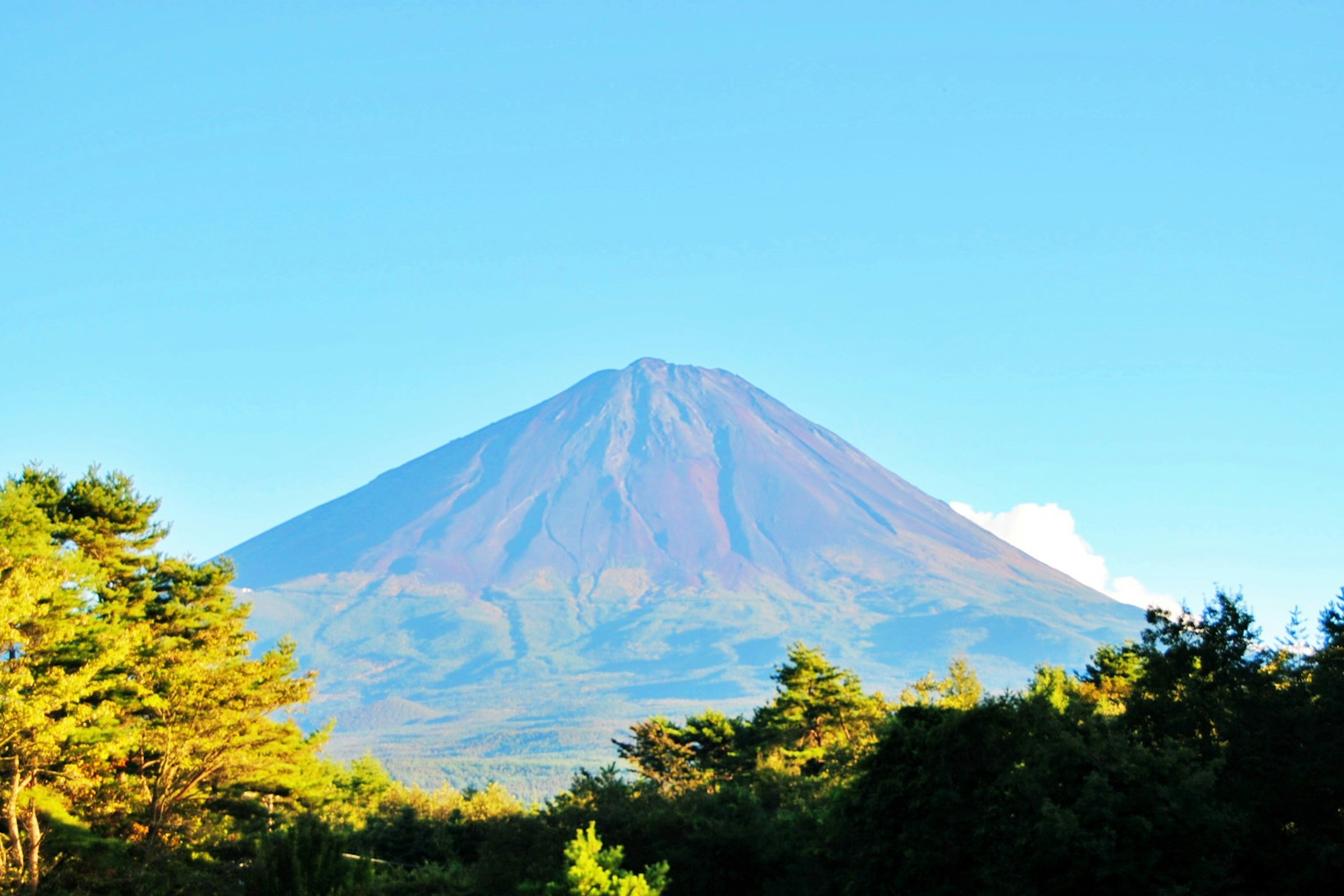 Majestic volcano towering under a clear blue sky