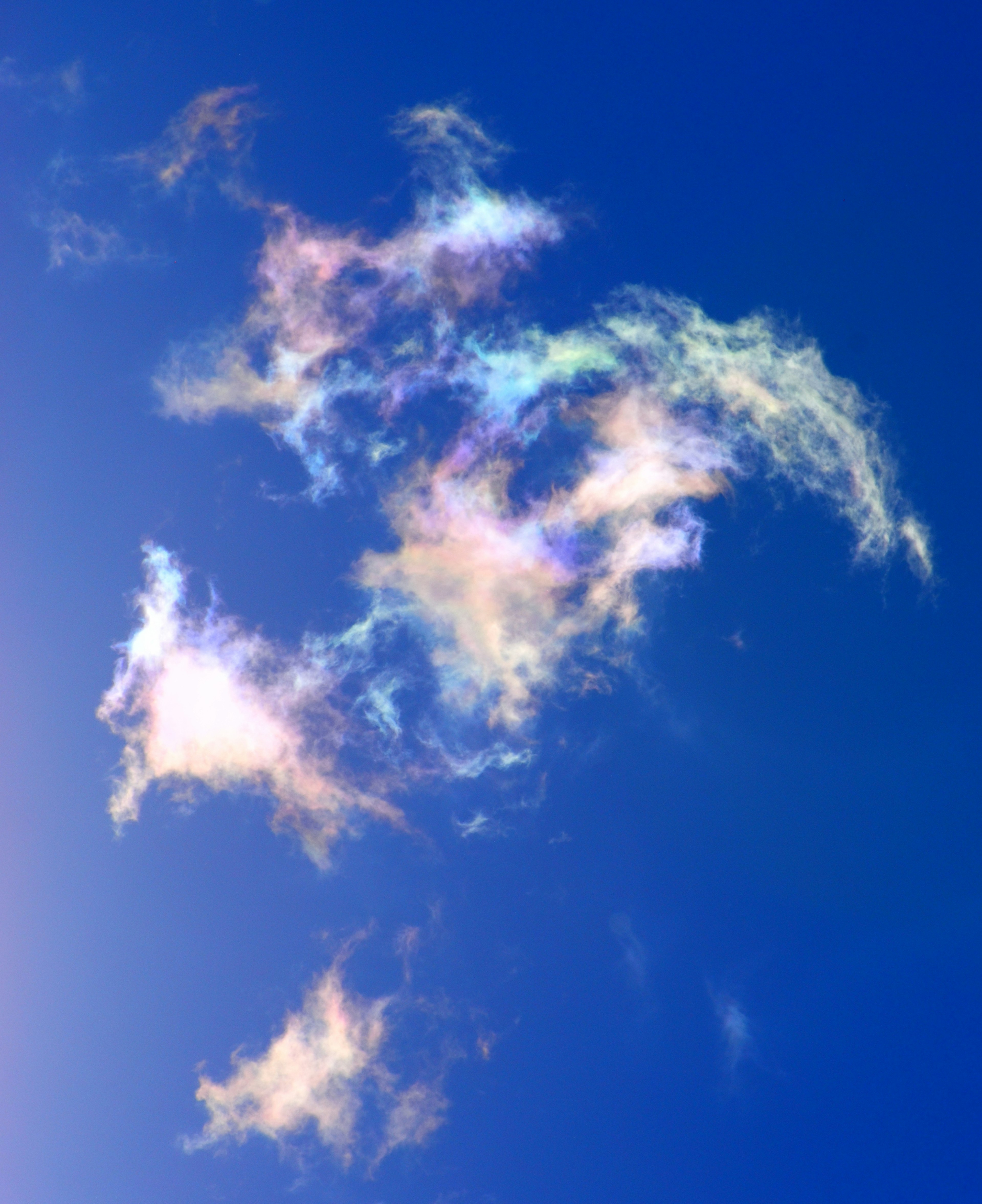 Colorful cloud formations in a blue sky