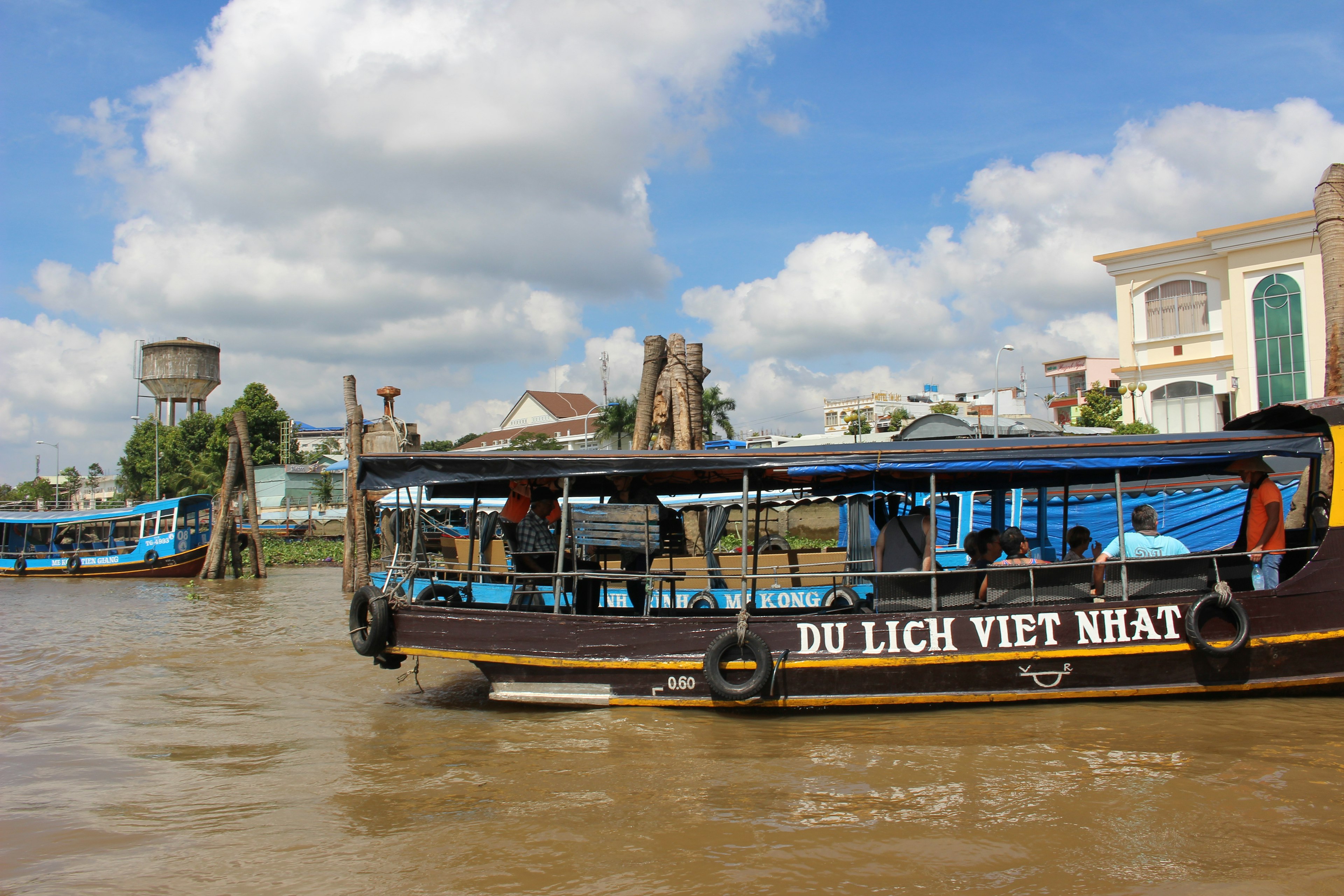 Tourist boat on the river with blue sky