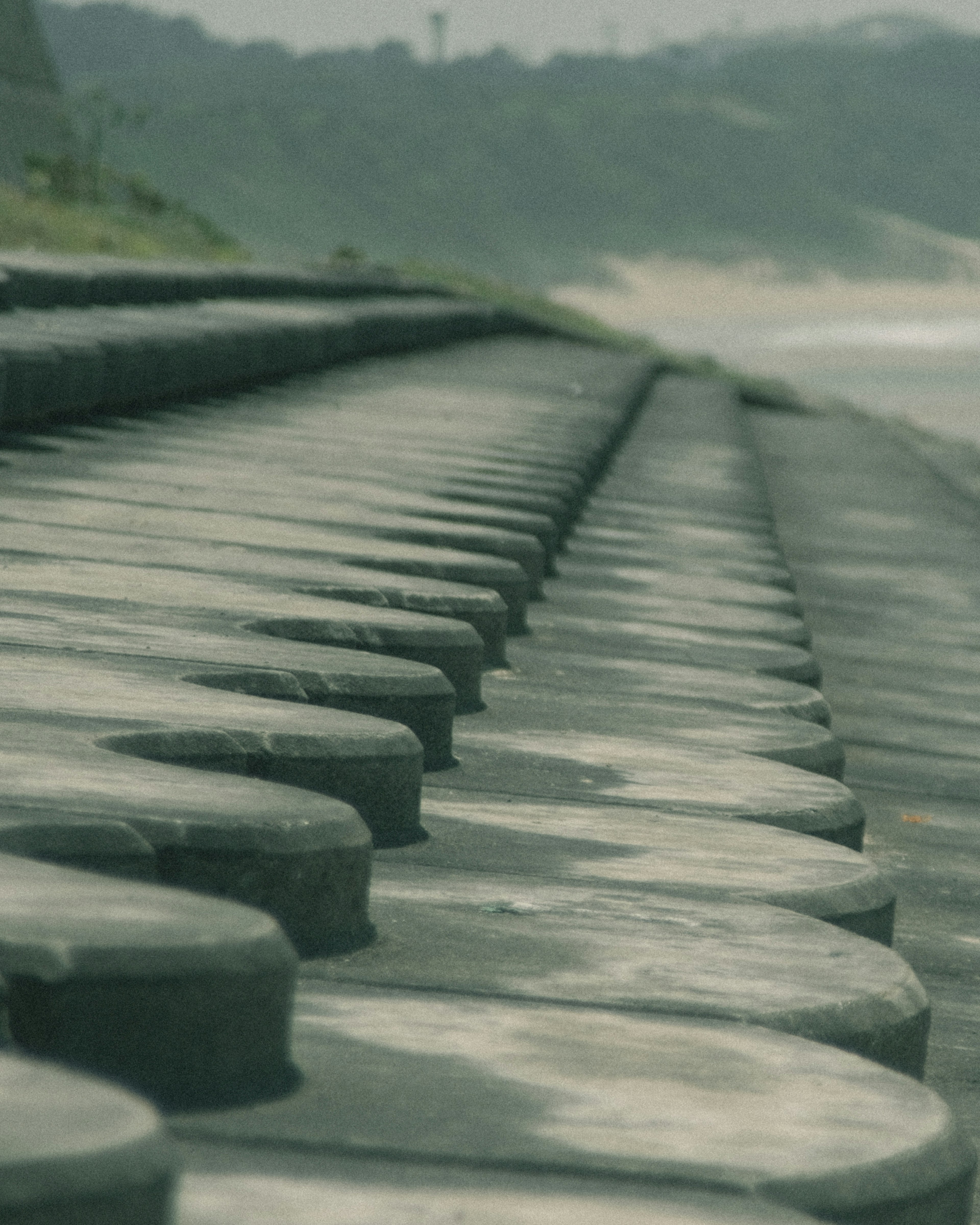 Row of concrete blocks along the coast