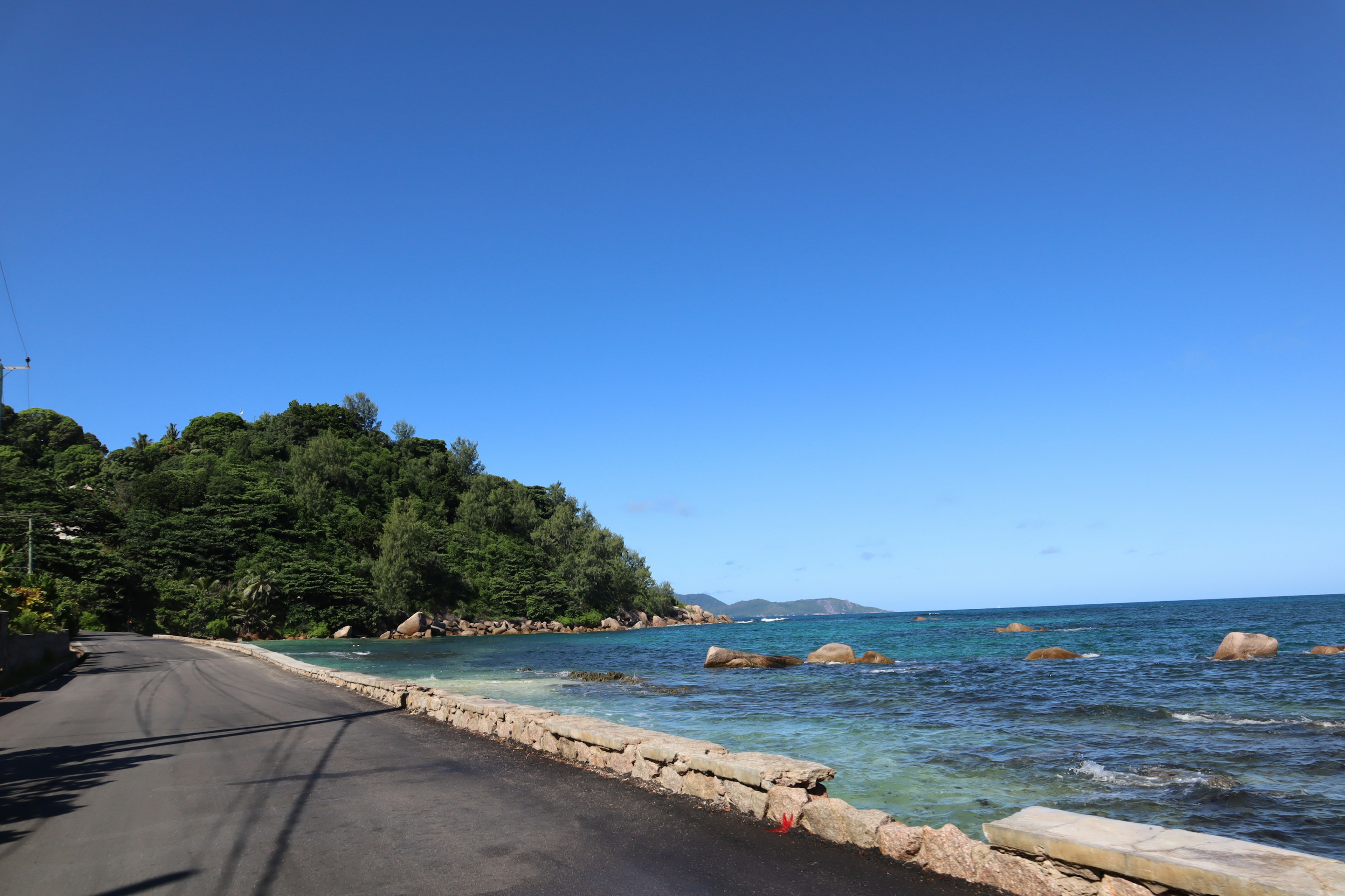 Coastal scene with a clear blue sky and ocean