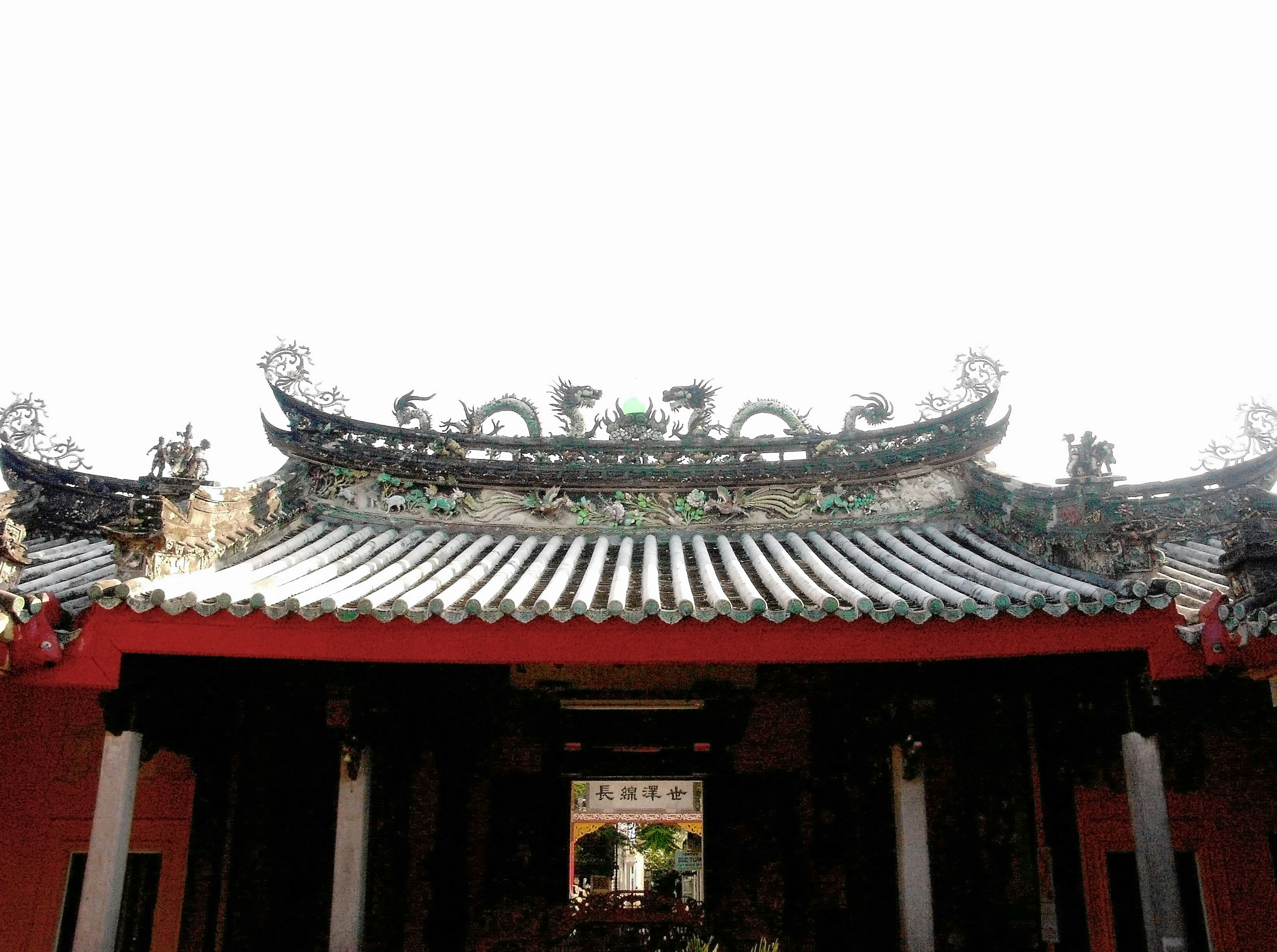 Historic temple with beautiful roof and decorative sculptures