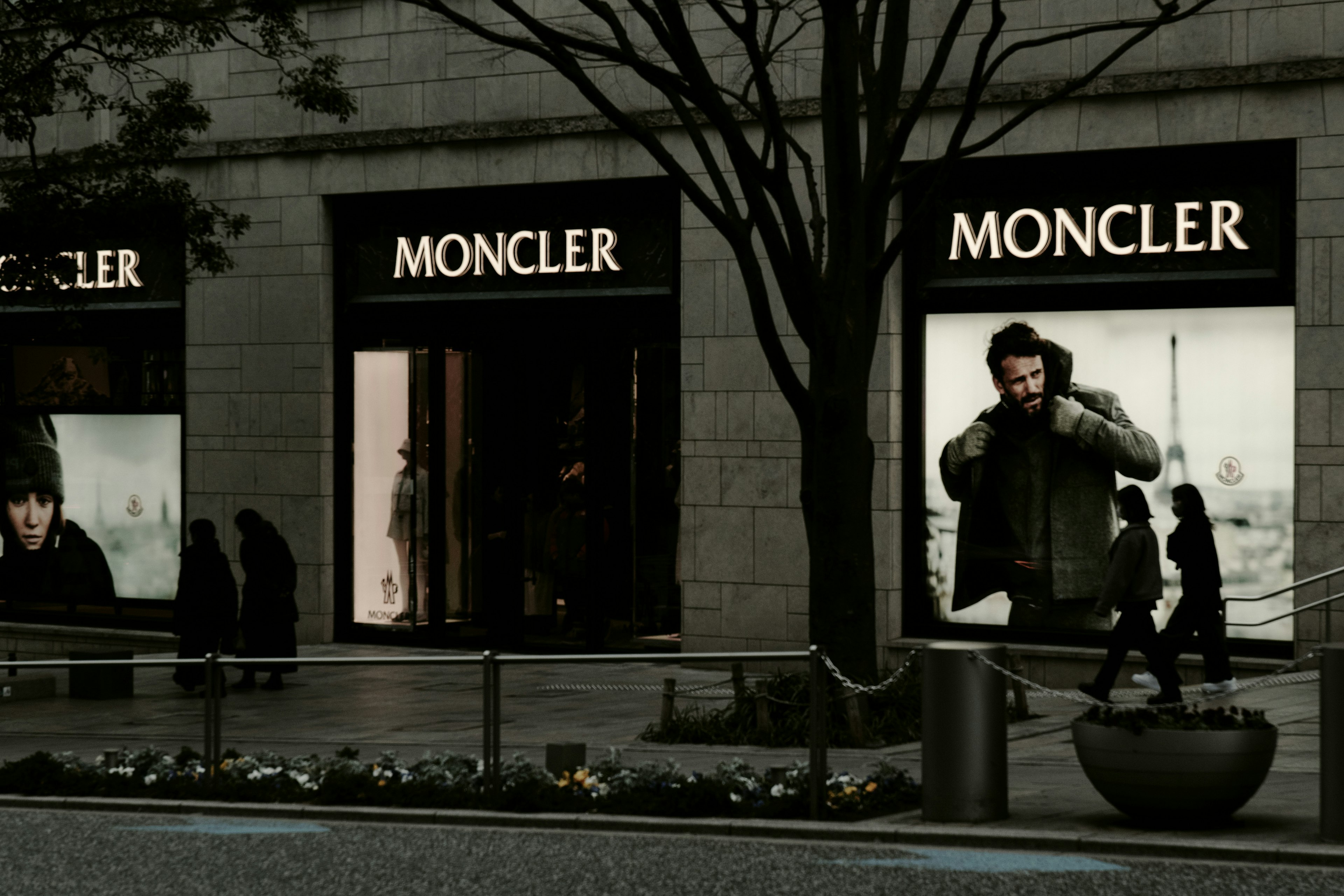 Moncler store front with advertising displays