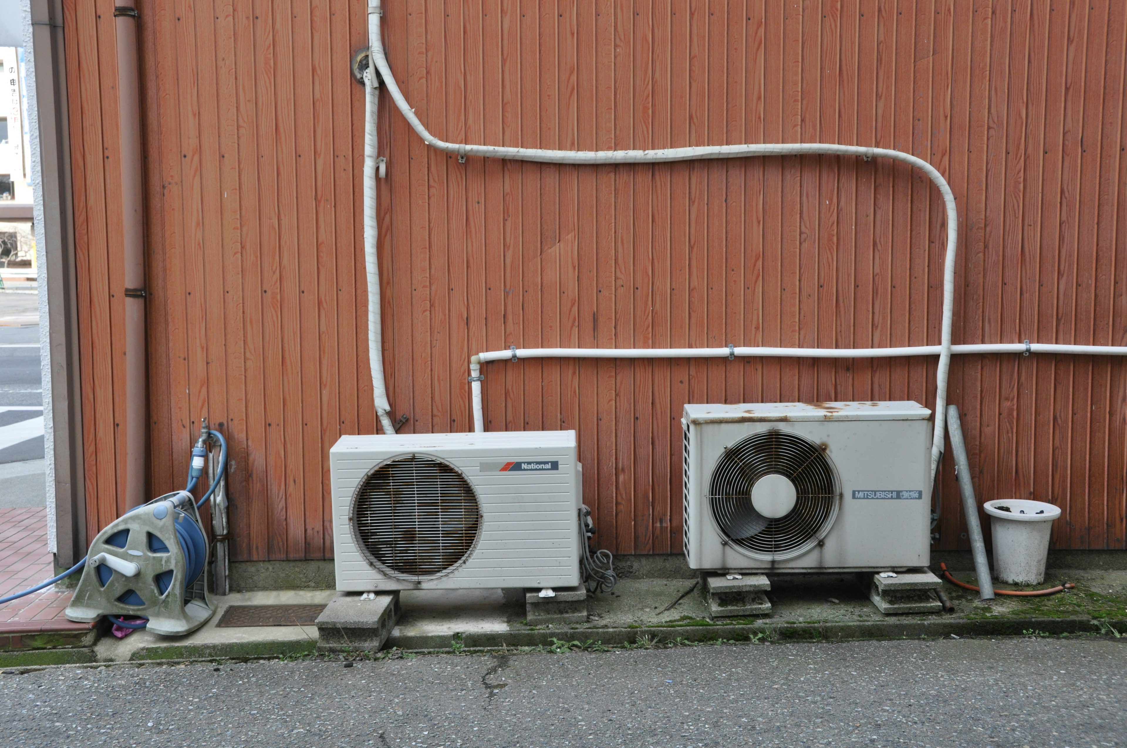 Air conditioning outdoor units mounted on a wall