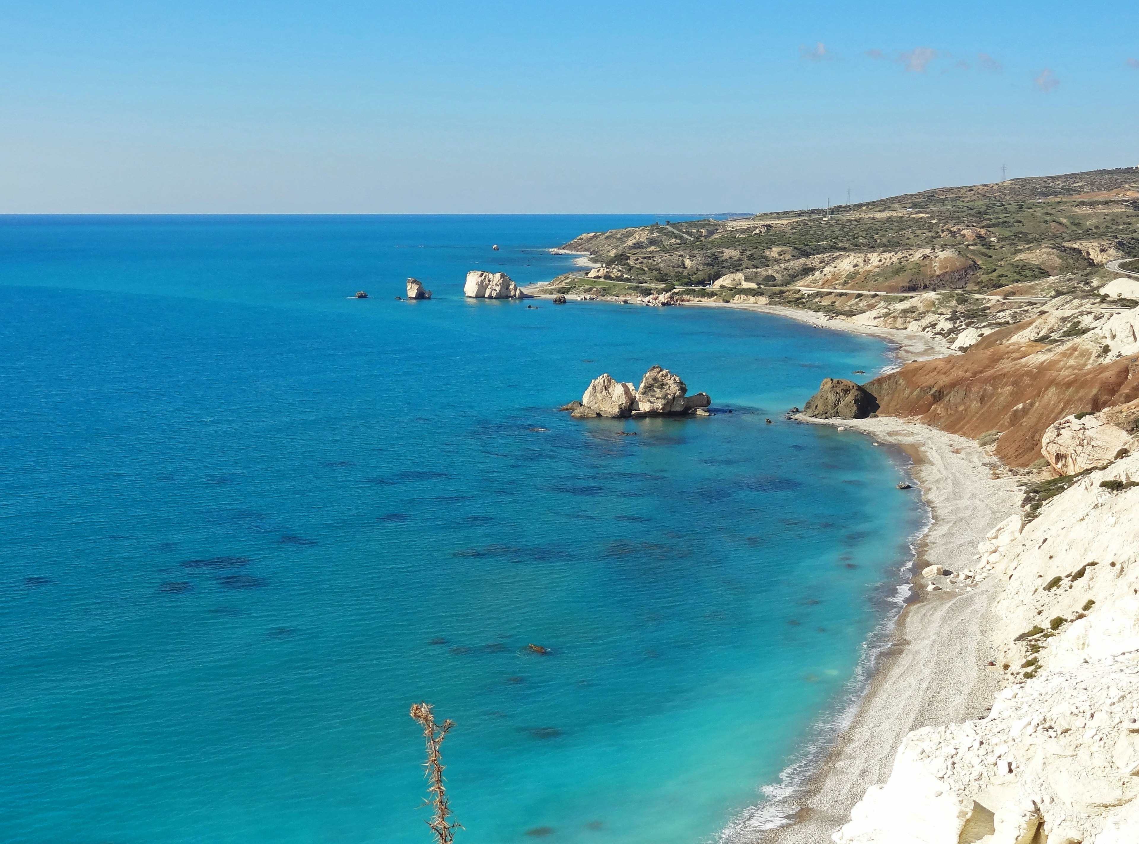 Beautiful coastline with blue sea and white sandy beach