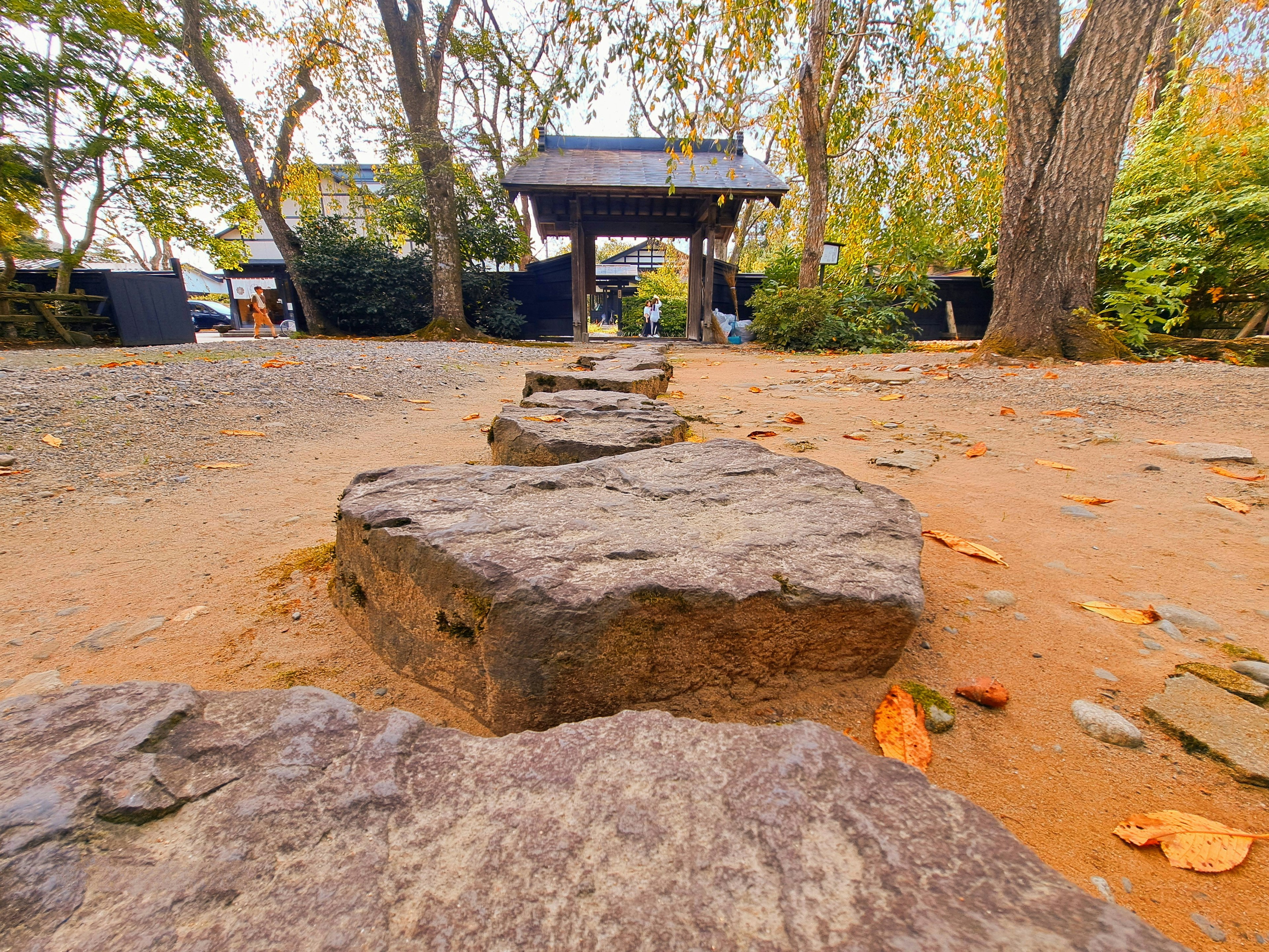 Path of stepping stones leading to a traditional Japanese garden