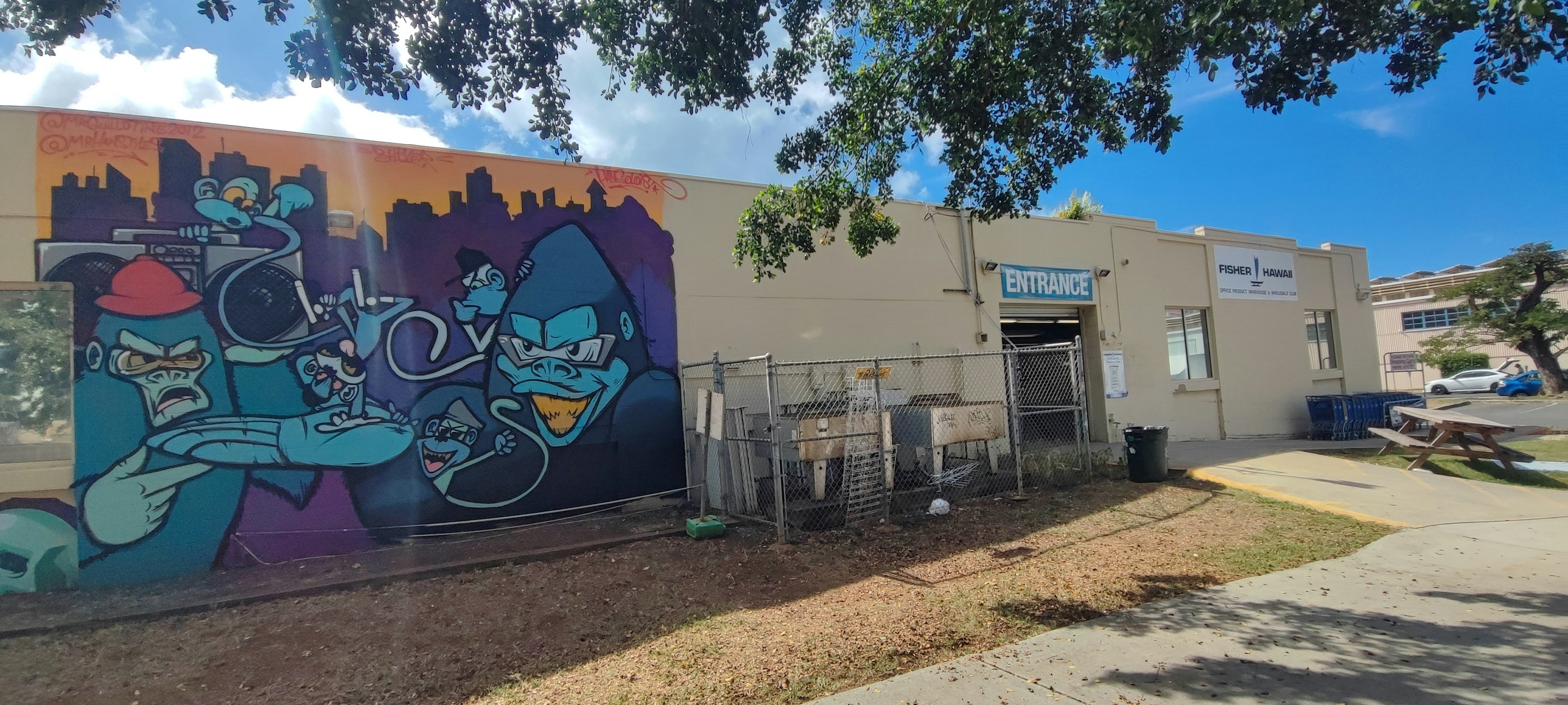 Exterior of a building featuring colorful graffiti art on the wall