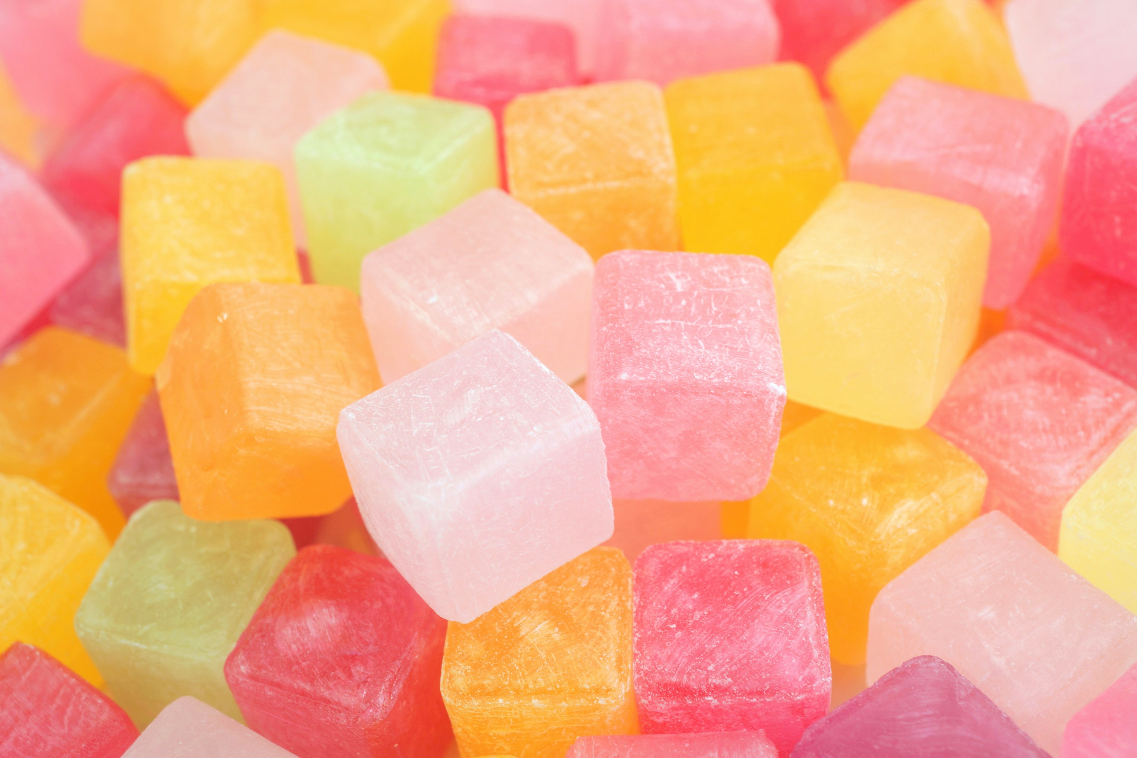 Colorful jelly candy cubes mixed together