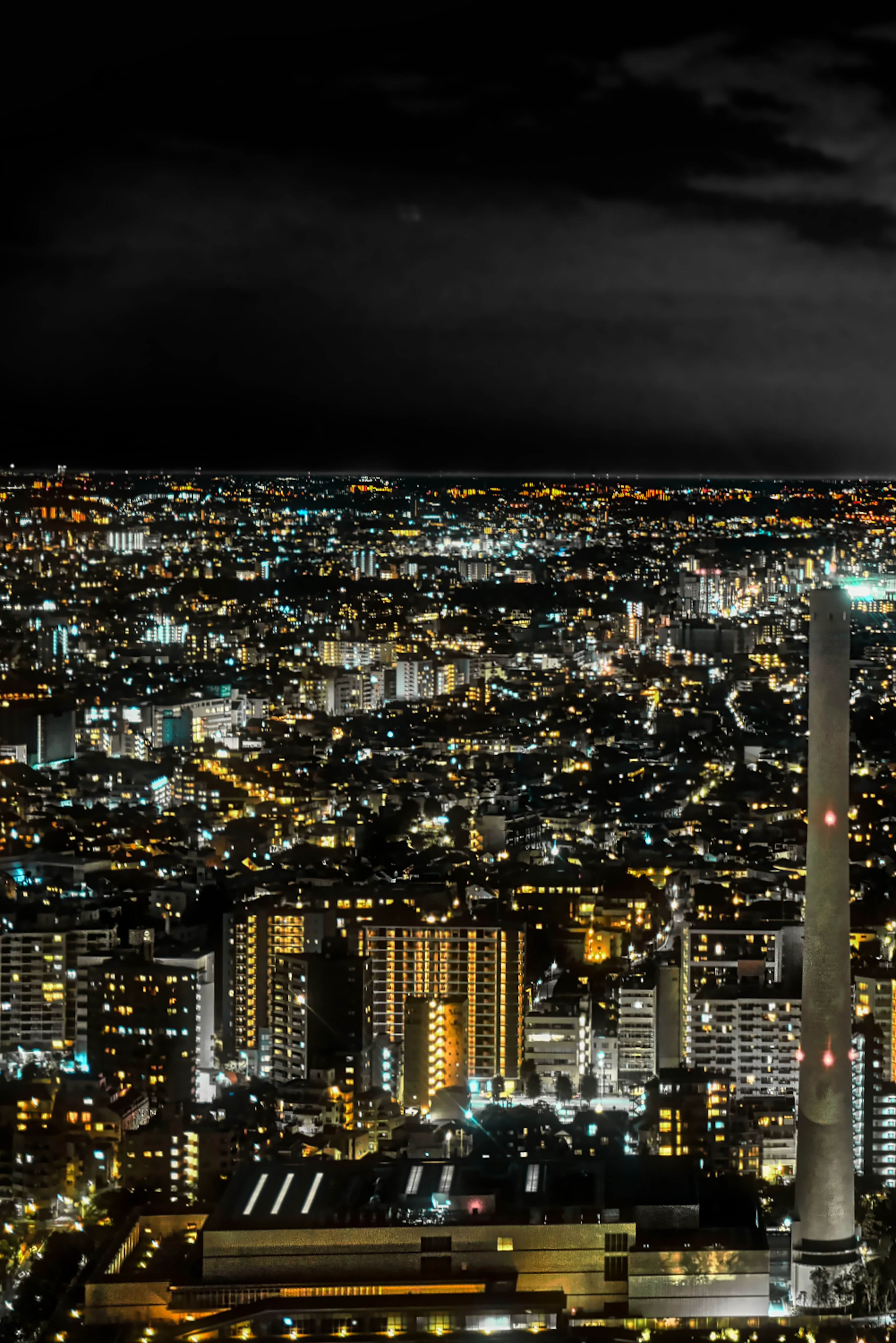 Night cityscape with illuminated skyscrapers