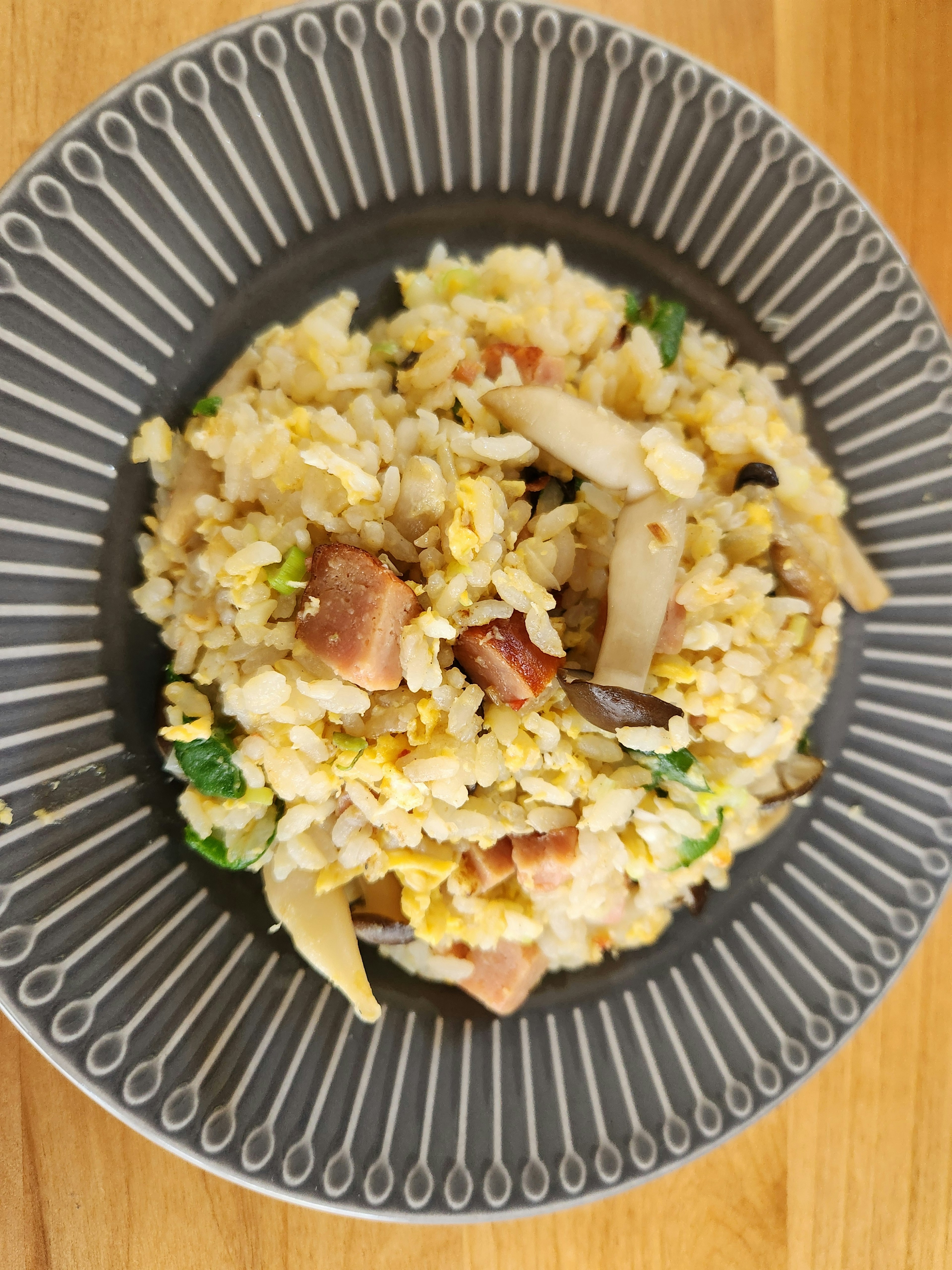 Plate of fried rice with various ingredients and textures