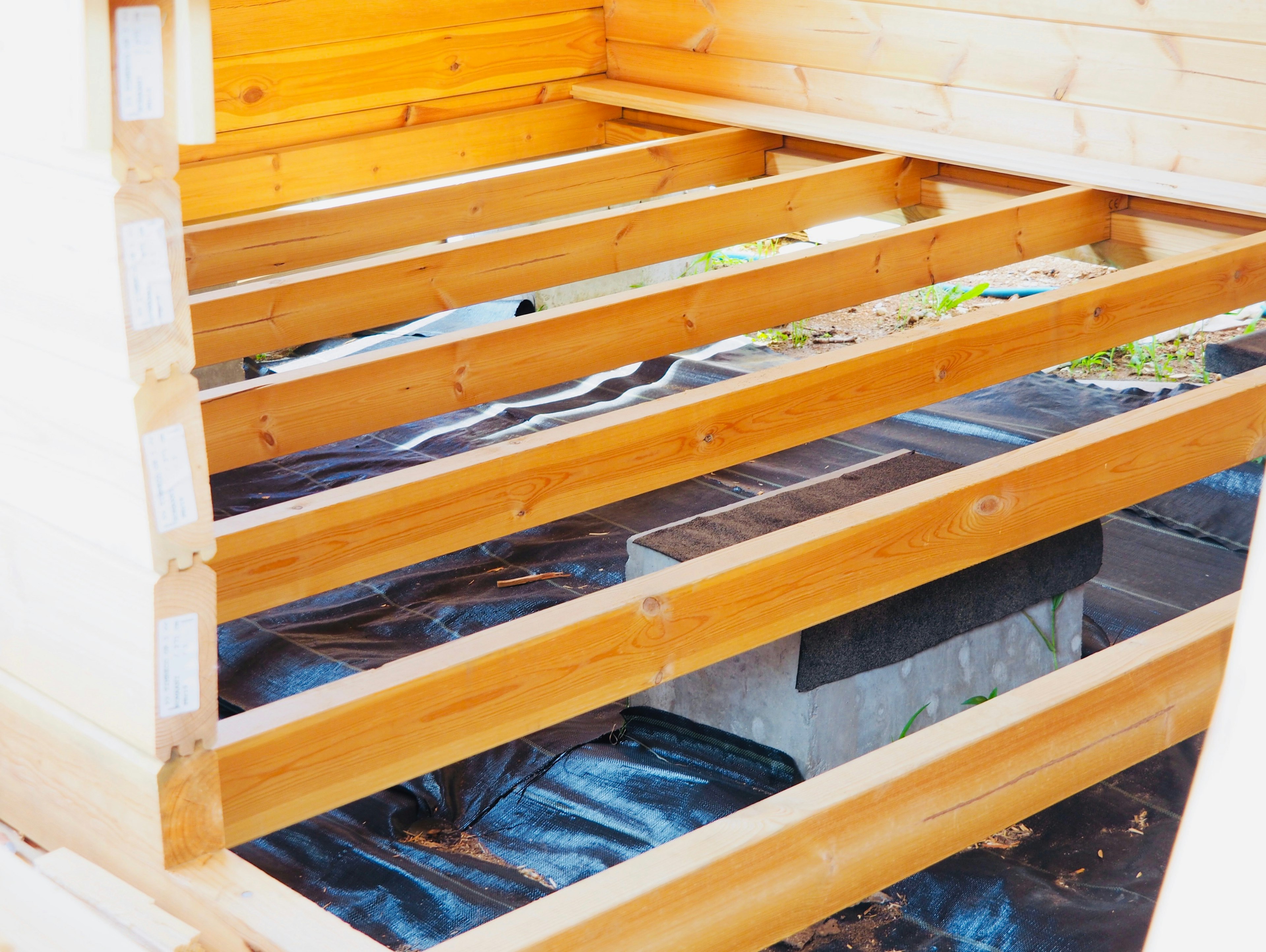 Interior view of a construction site showing wooden framing