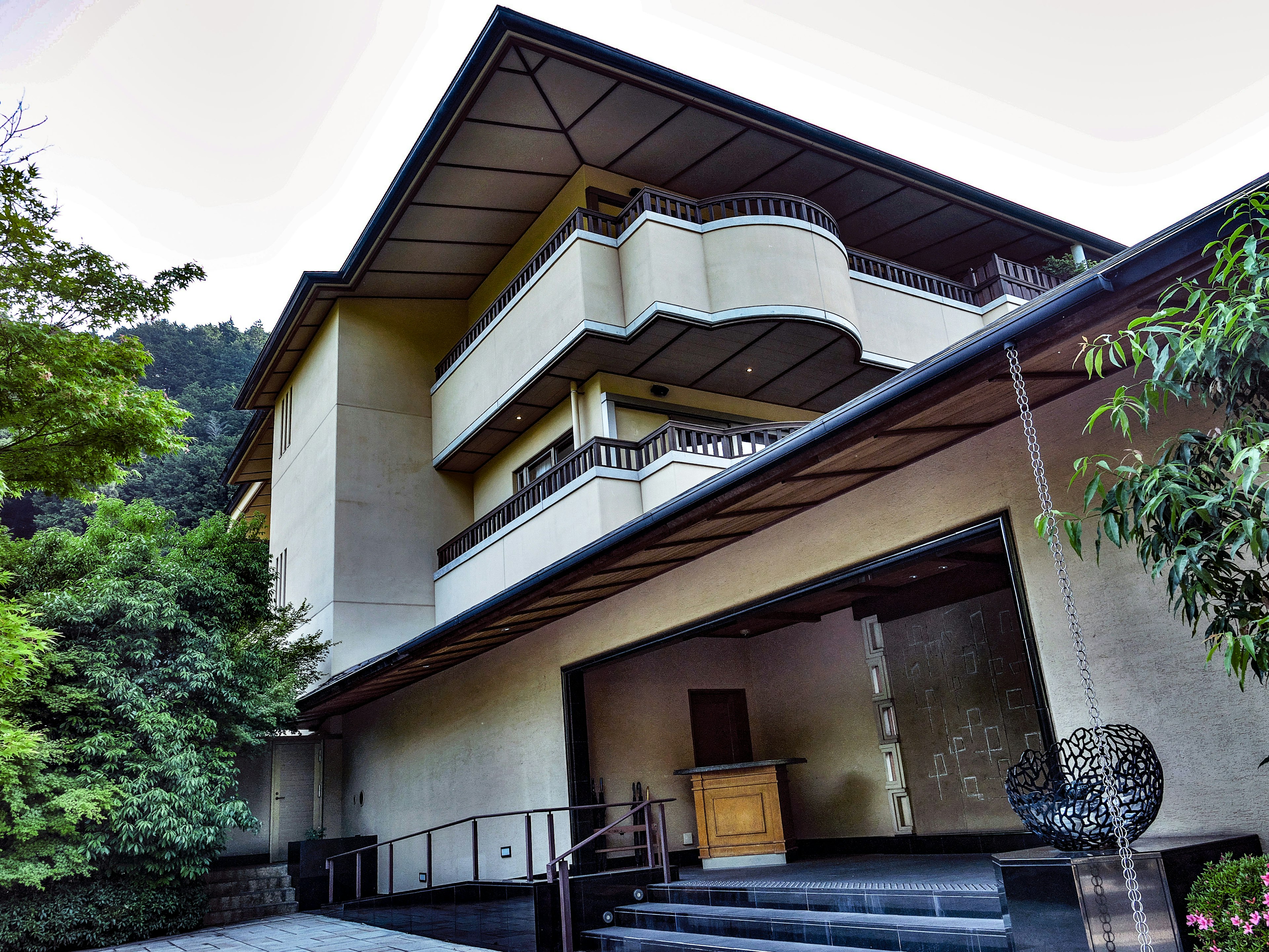 Modern architectural building surrounded by greenery