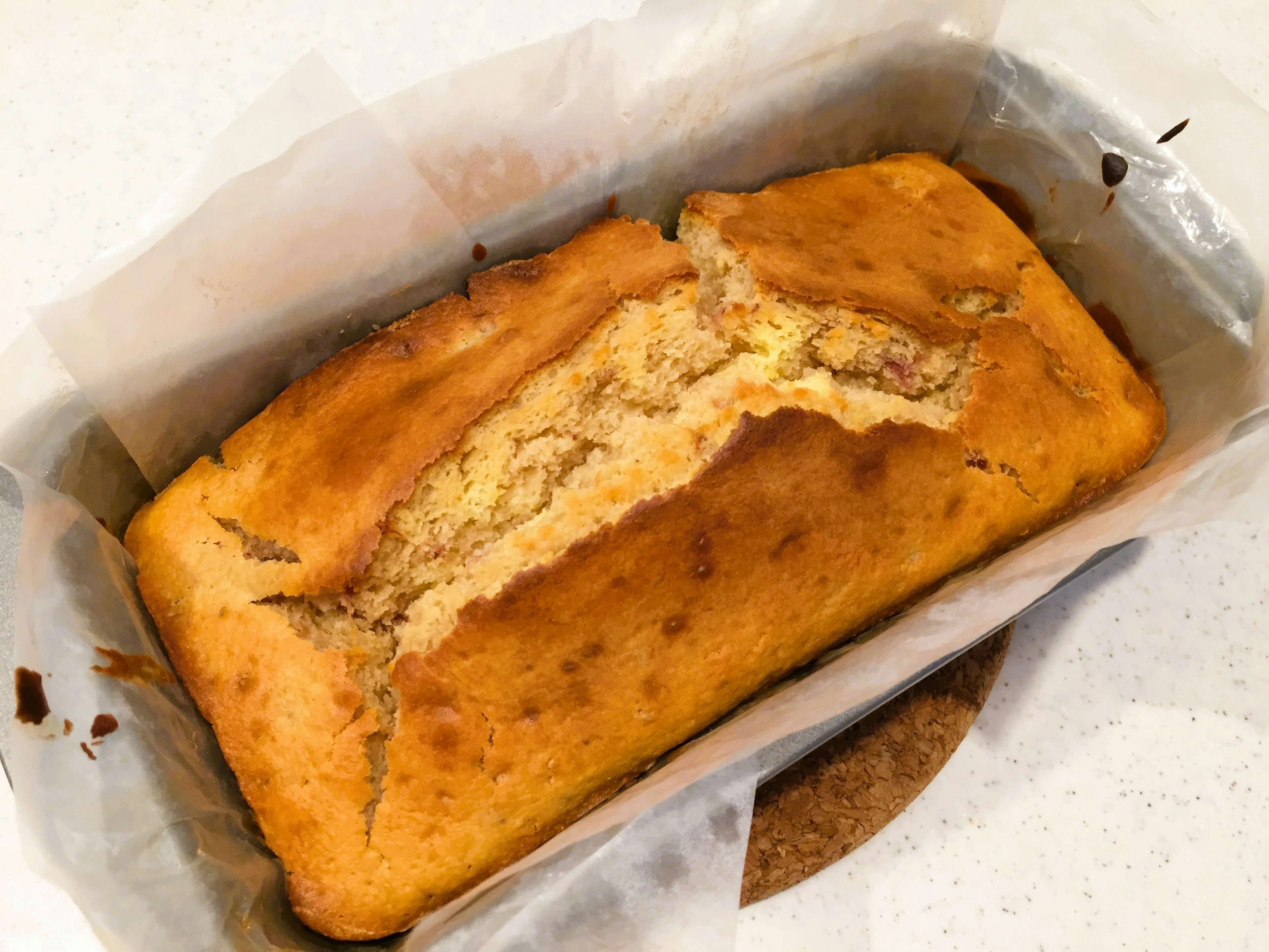 Freshly baked banana bread in a loaf pan