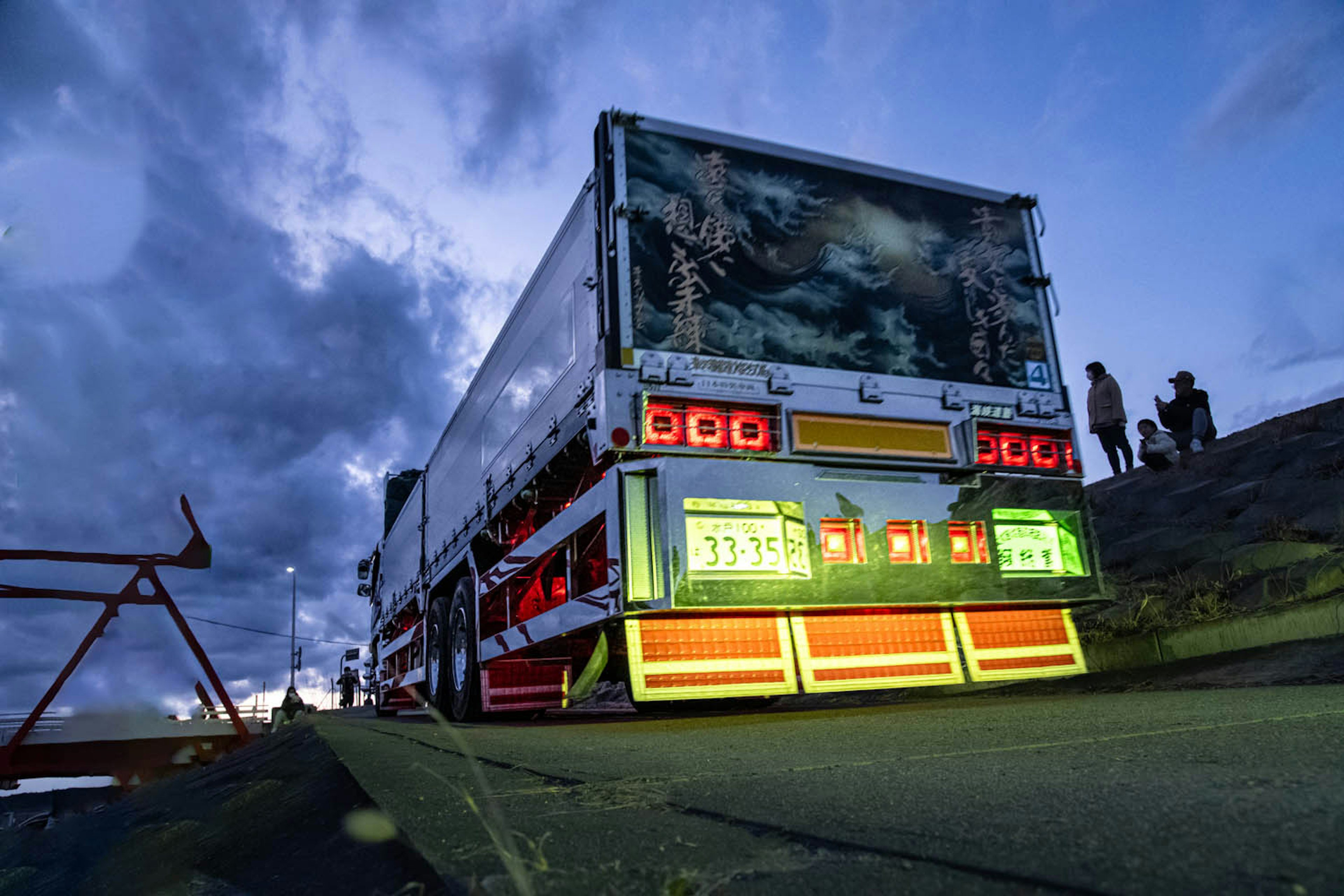 Colorful truck with striking graphics at dusk